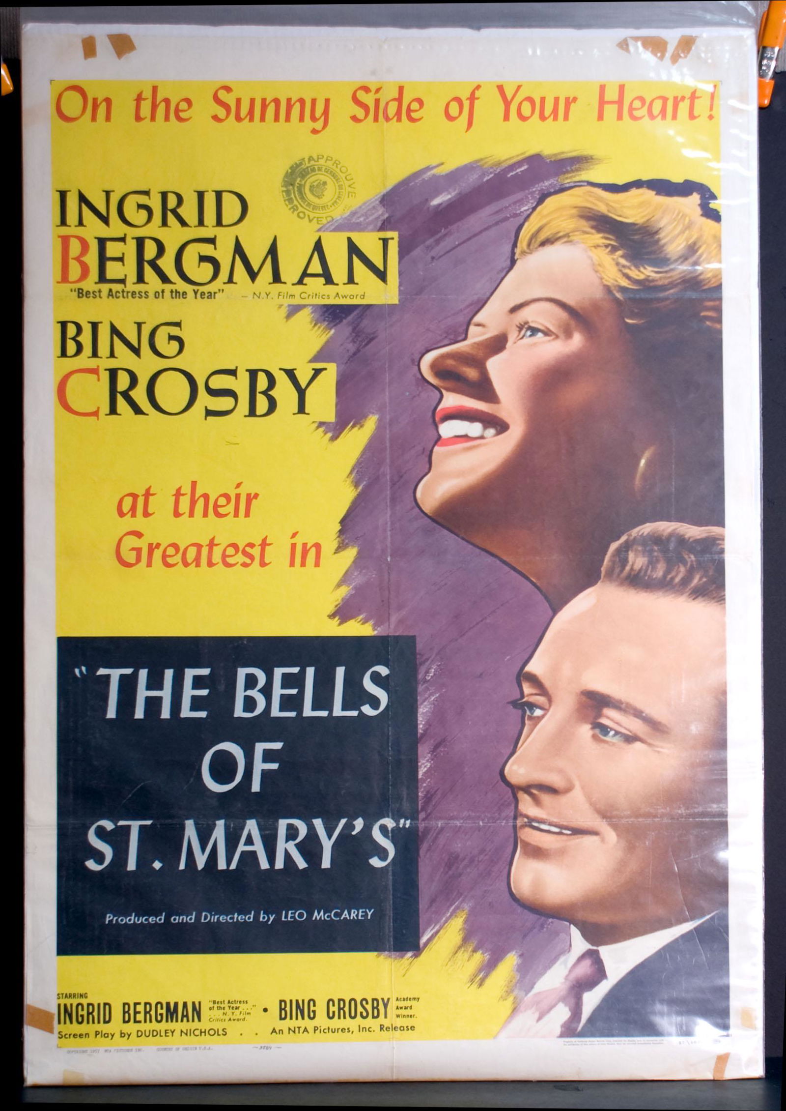 The Bells of St. Mary's Movie Poster, 1957: 1957 RKO. Starring Ingrid Bergman and Bing Crosby. Re-release. Tape repairs. 27" x 41".