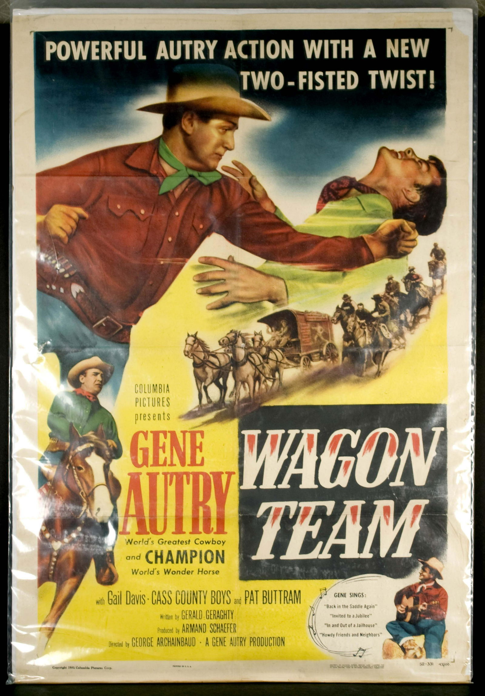 Wagon Team Movie Poster: With Gene Autry, "Powerful Autry action with a new two-fisted twist"! Edge damage along bottom, upper right corner missing, hole at center along fold lines. 27x41