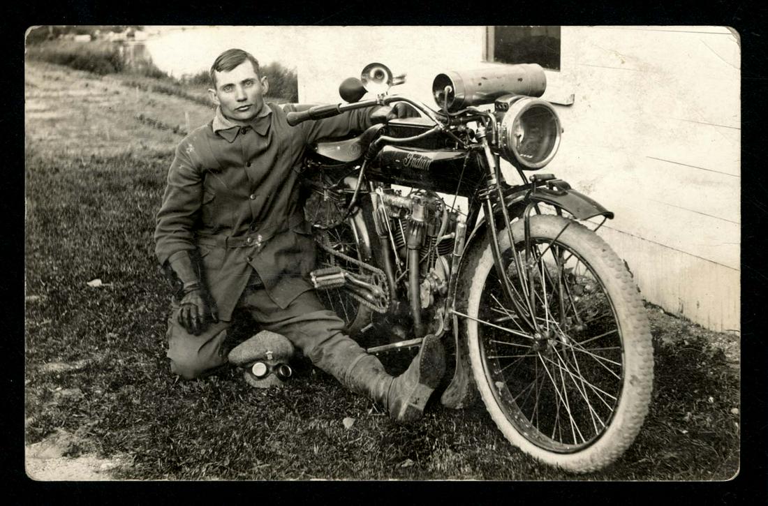 RPPC - Bikes & Motorcycles - Indian Motorcycle and: RPPC of an Indian motorcycle with rider sitting beside it. AZO back.