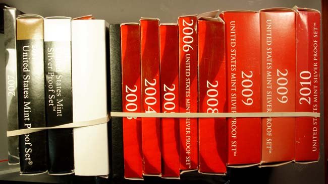 US Silver Proof Sets Various Dates - 13 total sets: Proof Sets from the Mint. Included in this bulk lot are 1997, 2003, 2004, 2005, 2006, 2007, 2008, (2 2009, 2010, (2 2011 and 2007 Silver proof quarter set.