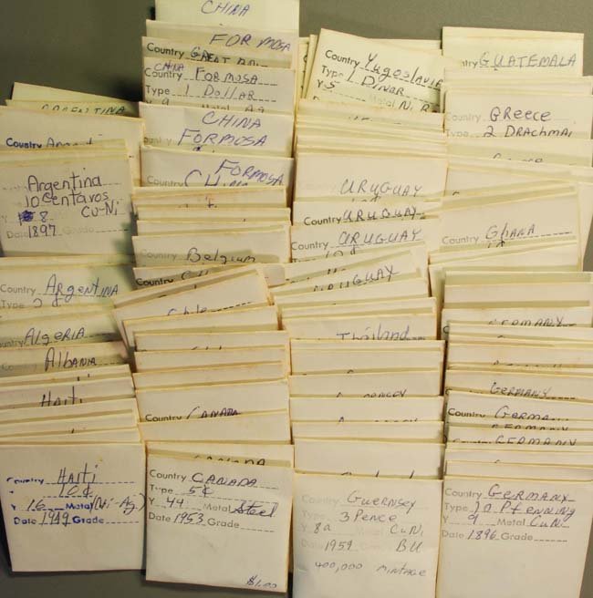 1800s-1900s World Mixed Lot: This lot includes over 100 envelopes of coins dated from the late 1890s to the 1960s. Countries represented are China, Germany, Ghana, Greece, Thailand, Uruguay, Venezuela, Yugoslavia, Chile, Great Br