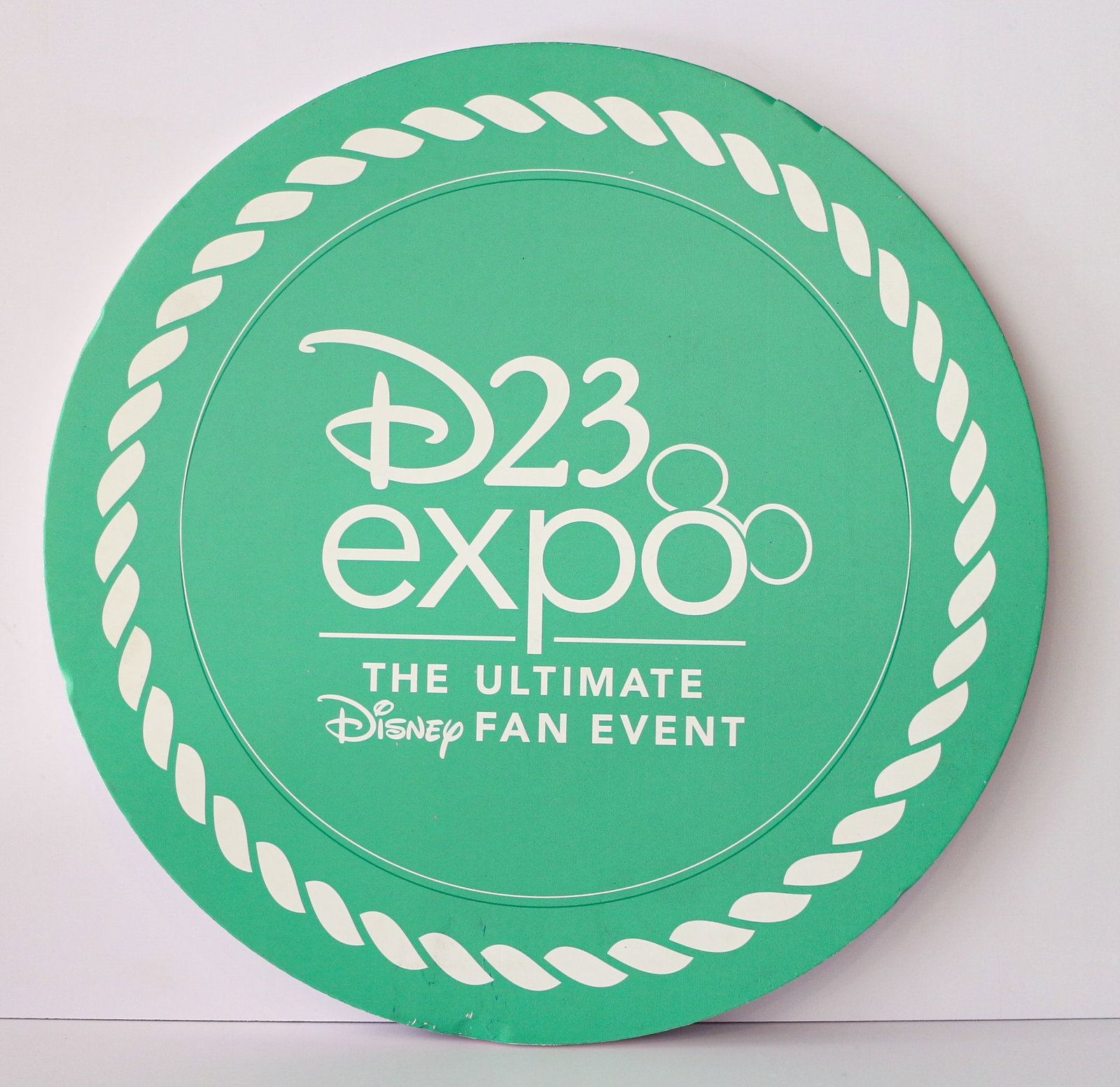 D23 Expo Logo Sign.: (Disney, c. 2022) This is a terrific sign used to promote D23 Expo, the largest Disney fan event in the world. Prominently featuring the D23 Expo logo with a Mickey-ear on the "o", the circular sign w