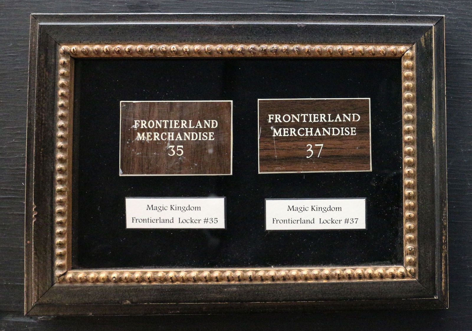 Pair of Magic Kingdom Frontierland Merchandise Locker Tags. (1 of 1)
