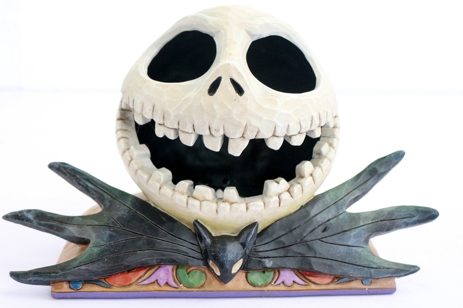 Jack Skellington Statue by Jim Shore.: (Disneyland, c. 2011) This is a terrific statue of Jack Skellington sculpted by Jim Shore as part of the Disney Traditions line. The half sinnester, half silly depiction of Jack lights up inside his s