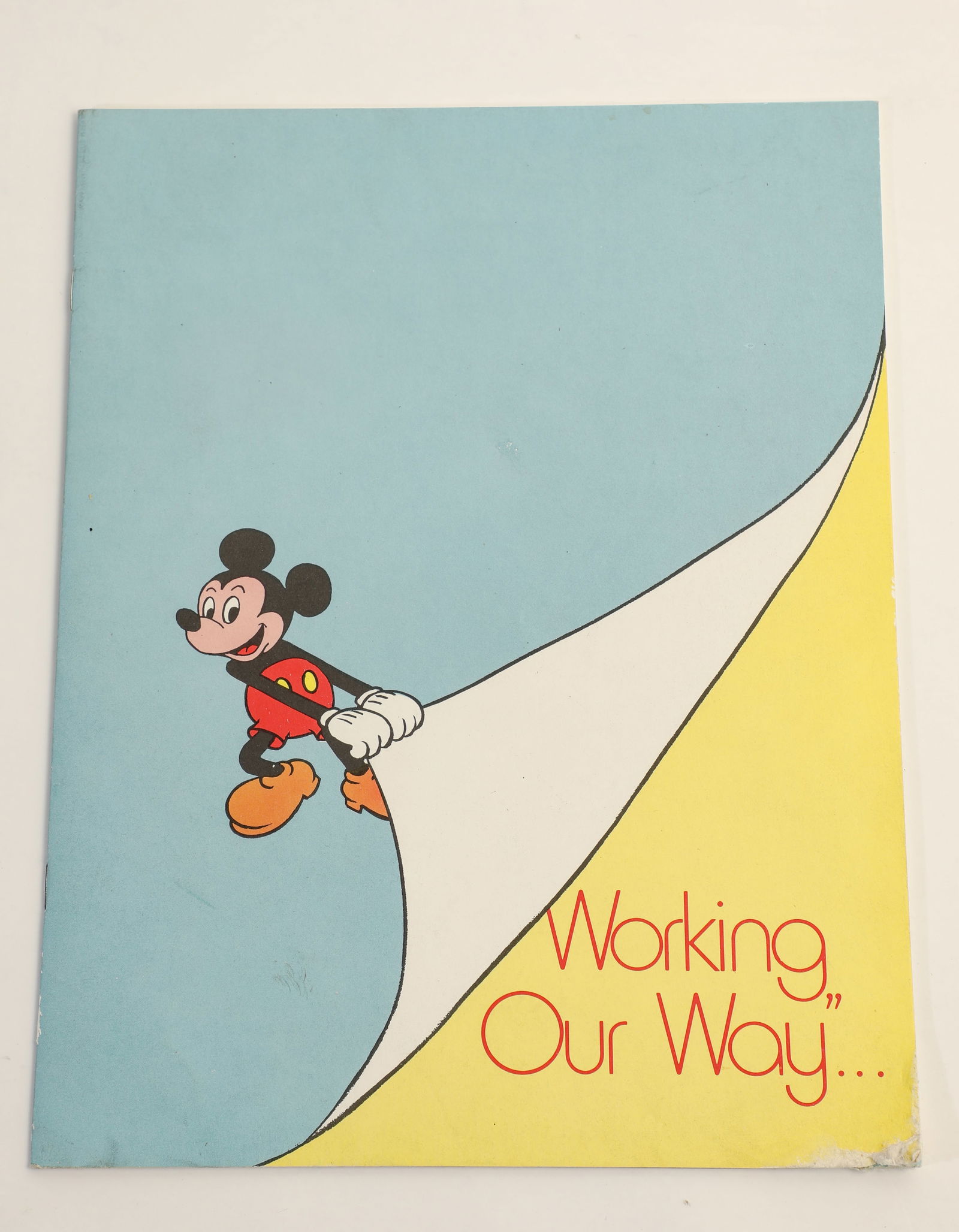 Cast Member "Working our Way" Training Manual.: (Disneyland, 1974) This is a very rare 16-page manual titled "Working our Way" that was prepared for Disneyland cast members in 1974 to discuss the Park's policies, practices, and procedures. Alongsid