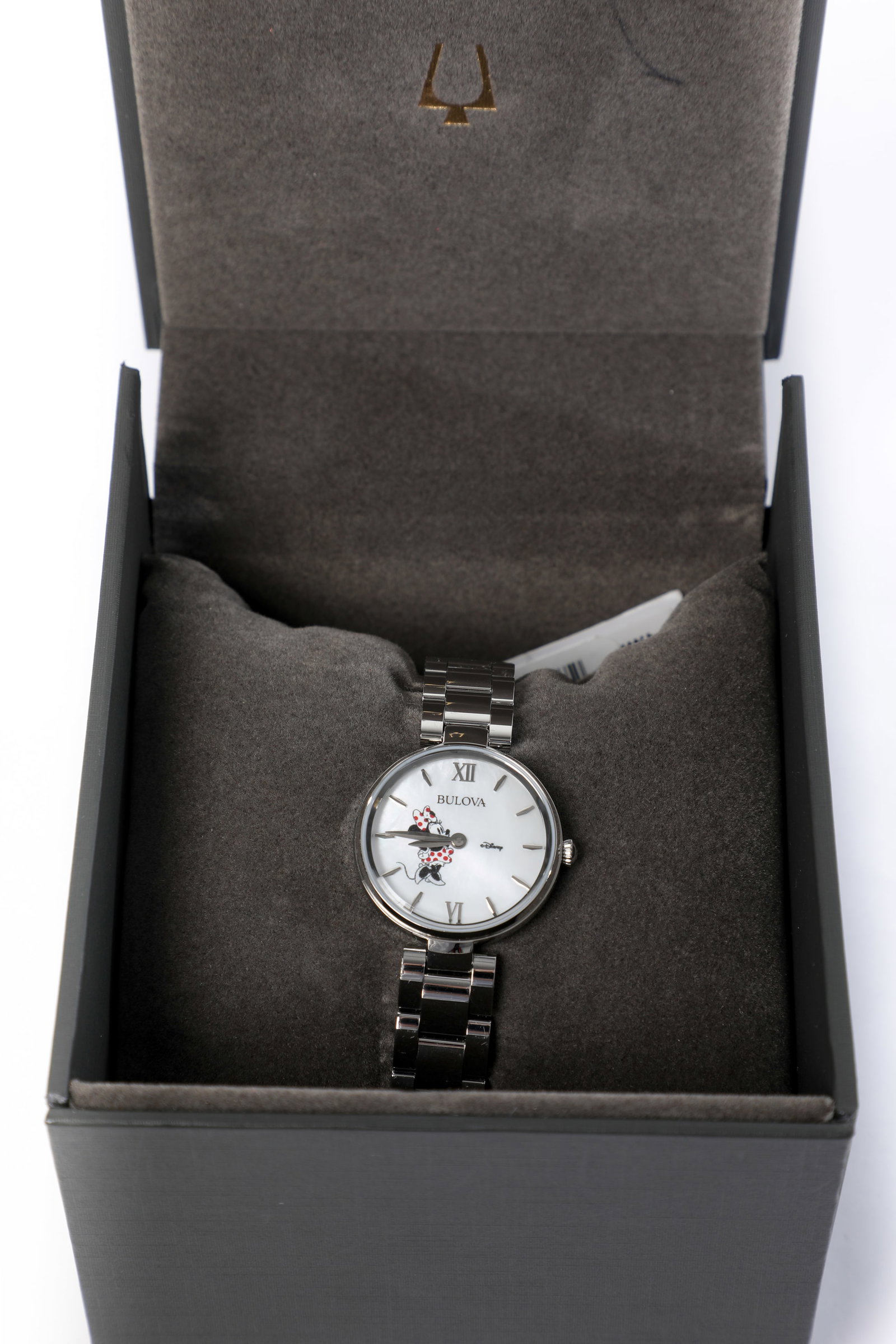 Disney - Bulova Minnie Mouse Wrist Watch (2000s).: Disney and Bulova has collaborated for this luxurious watch which combines timeless styling with the timely reminder of an American icon - Minnie Mouse! Made by Bulova, this stainless steel timepiece 