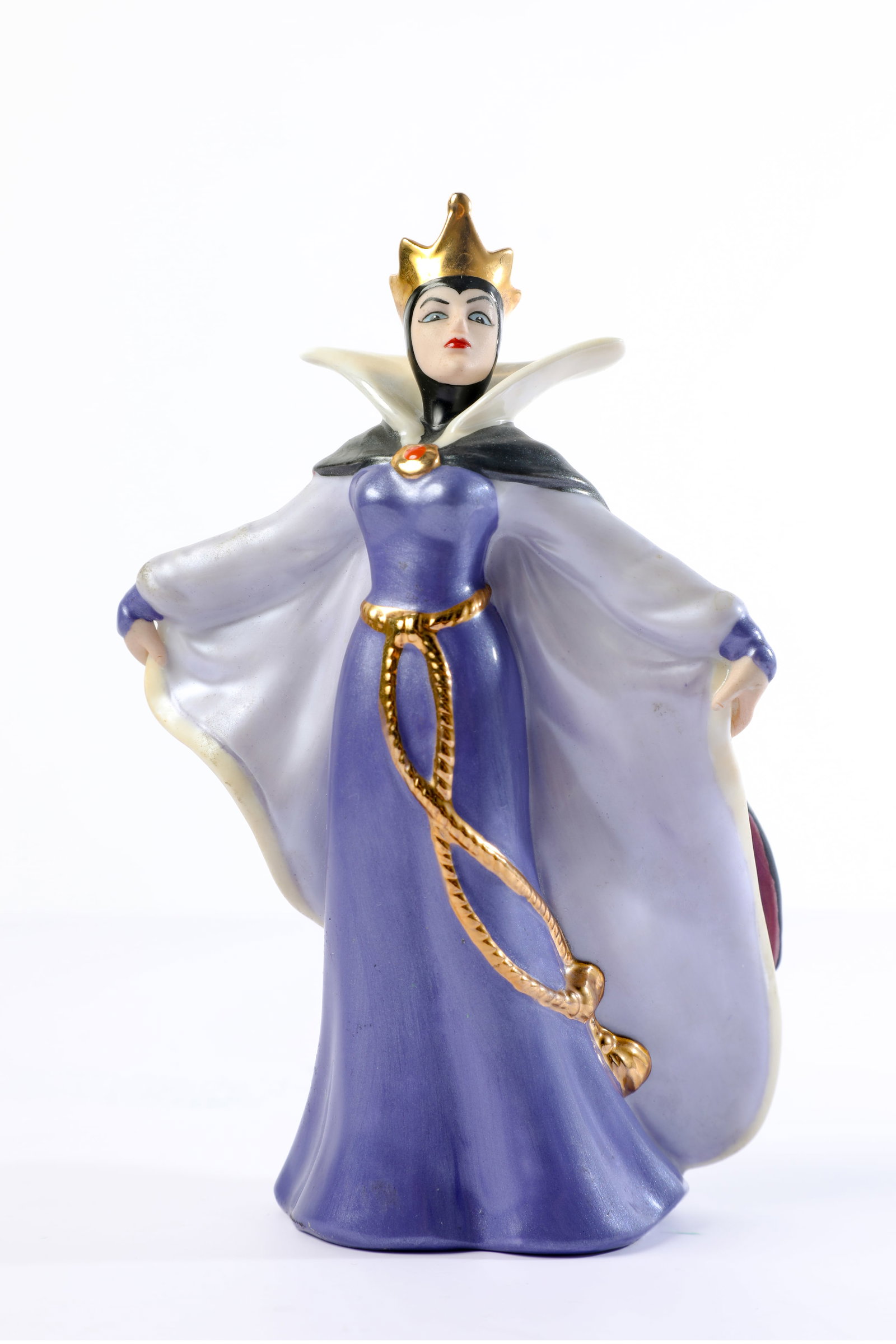Walt Disney’s Snow White and the Seven Dwarfs Evil Queen Figurine (2000s).: “Once Upon a Time…” the Evil Queen became the subject of a stunning, shiny figurine inspired by Walt Disney’s Snow White and the Seven Dwarfs! The original Disney Villain may be “the fai