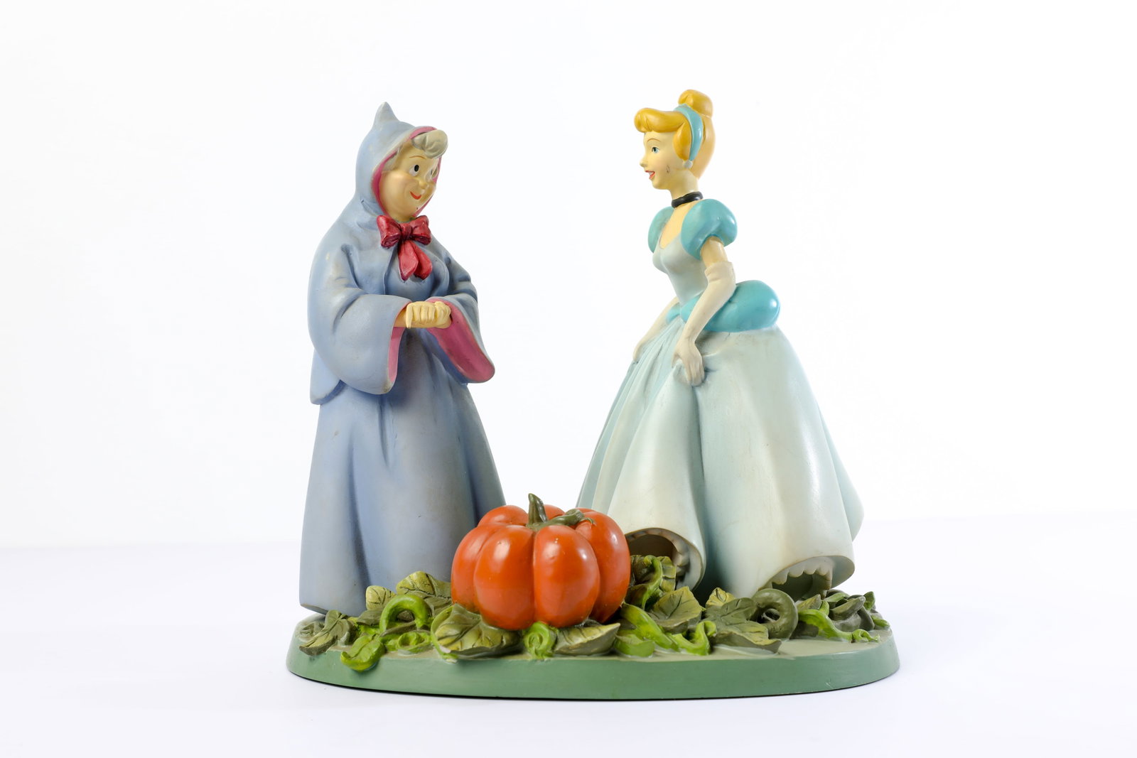 Disney Parks Animated Classics Cinderella & Fairy Godmother Figure (2000s).: “Now... I'd say the first fact you need is, um... a pumpkin.” The Fairy Godmother points her magic wand and prepares to make miracles for an inspirational figurine inspired by Walt Disney’s 