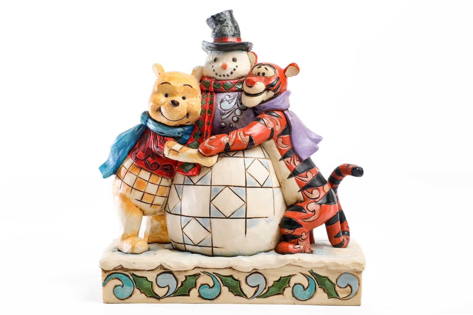 Jim Shore Disney Traditions - Winnie the Pooh & Tigger "Winter Hugs” Figure (2013).: Winnie the Pooh and Tigger welcome a new resident to the enchanted neighborhood of the Hundred Acre Wood, for the 2013 Jim Shore Disney Traditions "Winter Hugs" figure! Measuring approximately 7.5&rdq