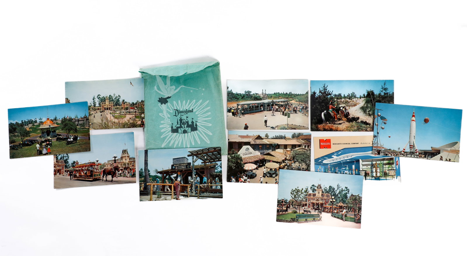 Disneyland Vintage Postcards and Souvenir Bag (1950s-1960s).: “Here, age relives fond memories of the past” with this collection of (10) postcards and (1) souvenir bag from the earliest days of Walt Disney’s original Magic Kingdom - Disneyland Park! Am