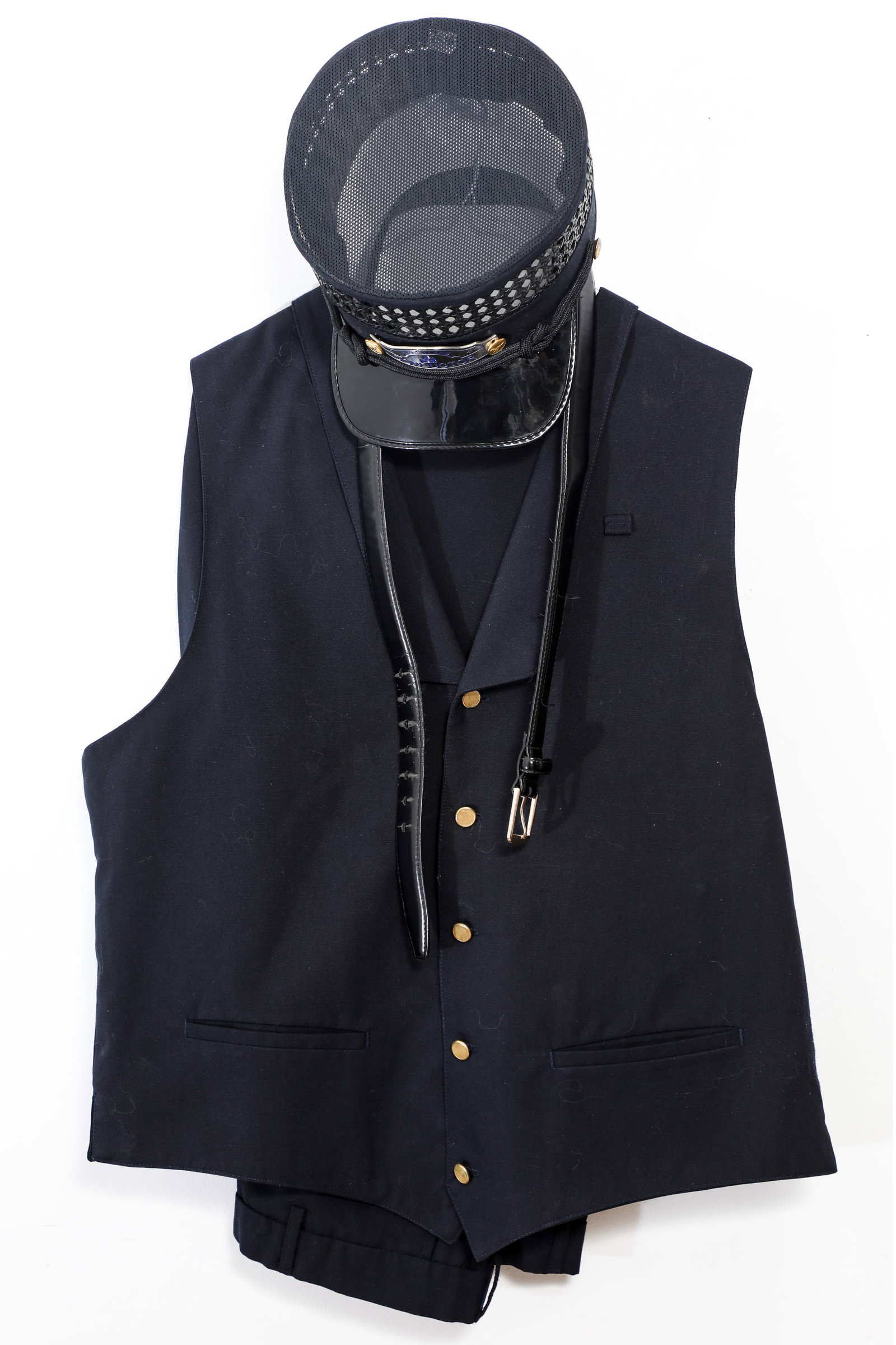 Disneyland - Railroad Conductor Costume (Walt Disney, c. 1990s).: “All aboard” for the very rare costume that distinguished Conductors of the Disneyland Railroad! This costume lot includes pants, a belt, a vest and a hat. The hat is accompanied by its rarely