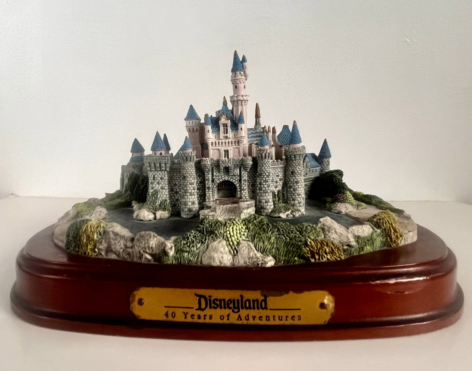 Disneyland 45th Anniversary Sleeping Beauty Castle Figure.: (Disneyland, 1990) This is a very rare painted figure of Sleeping Beauty Castle at Disneyland. Created for Disneyland's 45th anniversary in 1990, the figure measures approximately 9" long and is in go