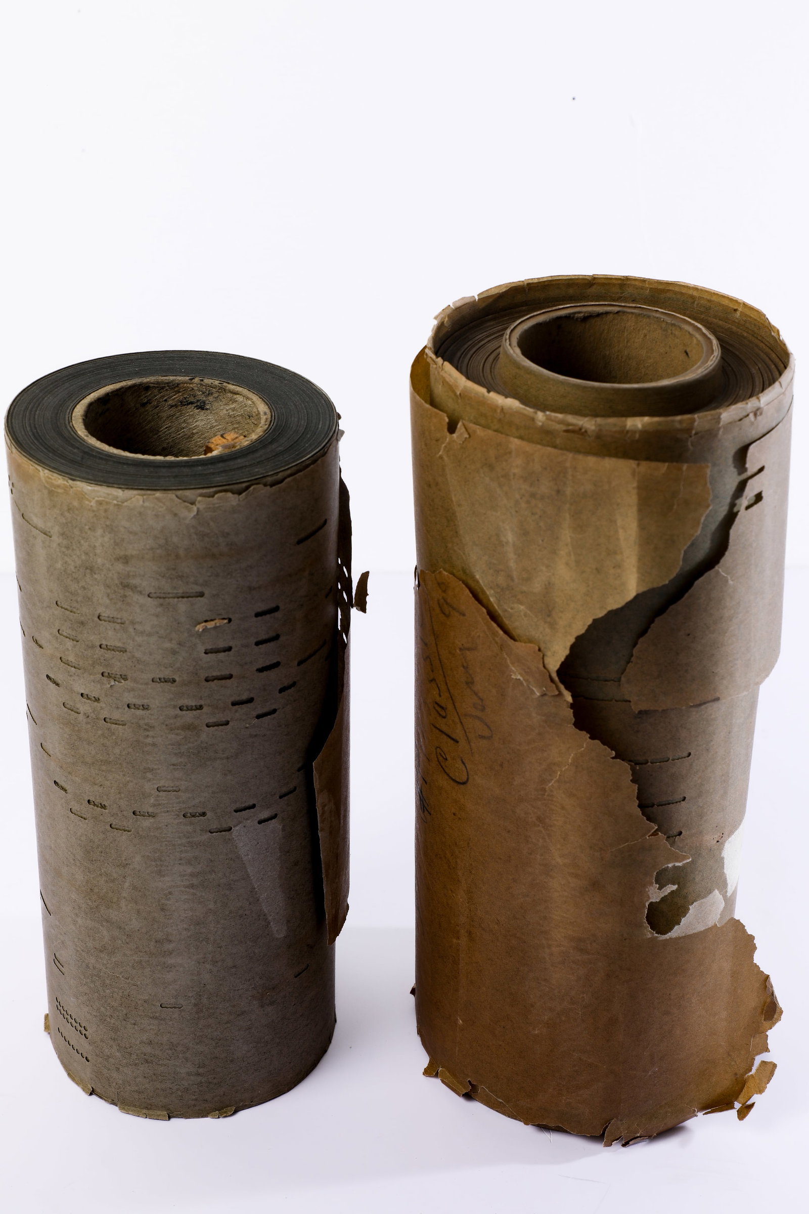 Disneyland - Pair of Frontierland Orchestrion and Piano Player Rolls (1990s-2000s).: This particular pair of paper rolls piped popular tunes into player pianos around Frontierland at Disneyland Park! In 1953, Walt Disney personally purchased a large collection of automatic and manual 