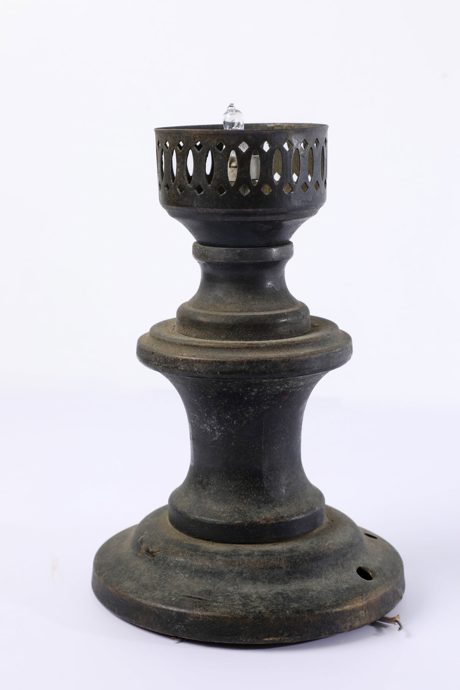 Disneyland - Pirates of the Caribbean Table Mounted “Oil Lamp” Prop (2000s).: “We kindle and char; inflame and ignite.”This table-mounted oil lamp prop is one of many that played an important role in the “pirate’s life” depicted in the Pirates of the Caribbean