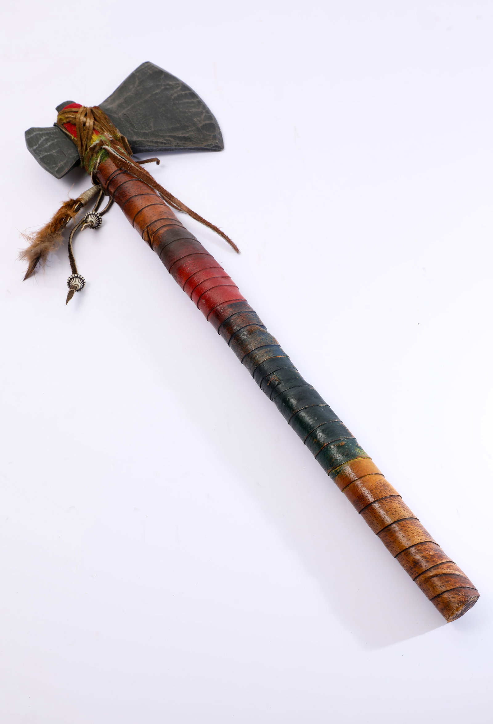 Disneyland - Frontierland Pioneer Mercantile Shop Tomahawk Prop (1990s-2000s): “Here, we experienced the story of our country’s past… the colorful drama of Frontier America.” This tomahawk hatchet prop features a wrapping that evokes a traditional Navajo-style, and w