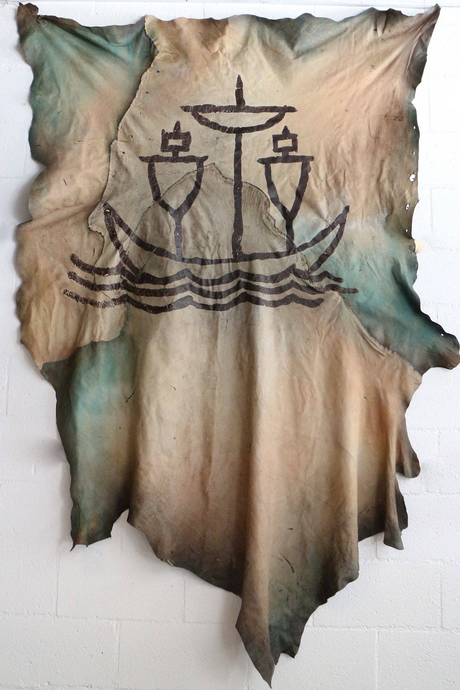 Disneyland - Frontierland Pioneer Mercantile Indian-Painted Animal Skin Prop (2000s): “Here, we experienced the story of our country’s past… the colorful drama of Frontier America.” A familiar-looking, three-masted sailing ship plies the river on this painted animal skin, a