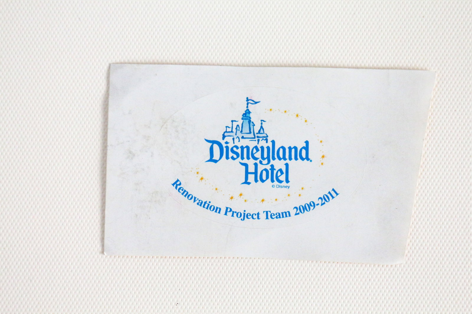 Disneyland Hotel - WDI “Renovation Project Team Decal (2009-2011): Relive the birth of “new magic” with this special decal proudly worn on the helmets of Walt Disney Imagineers who re-imagined the fabulous Disneyland Hotel! Over a three-year period, The
