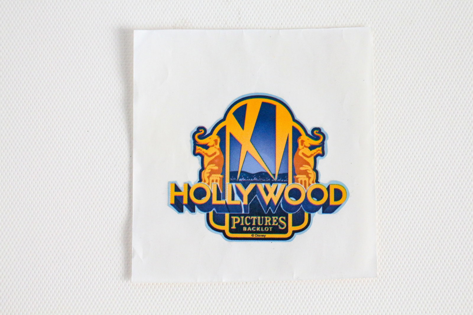 Disneyland - WDI “Hollywood Pictures Backlot” Team Decal (1995-2001).: “Hooray for Hollywood” and this decal that identified the magic makers who brought Hollywood Pictures Backlot to Disney California Adventure Park at Disneyland Resort! Over seven years, Walt
