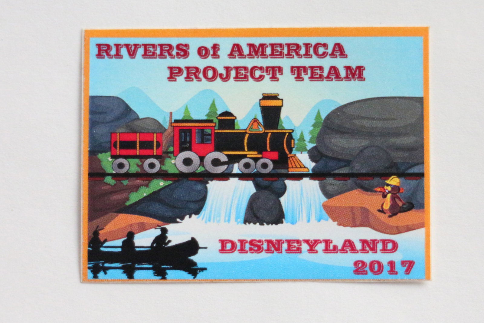 Disneyland - WDI “Rivers of America Project Team” Decal (2016-2017).: “Your attention please” for a special decal proudly worn on the helmets of Walt Disney Imagineers during a major rehabilitation of the Rivers of America at Disneyland! In 2017, the