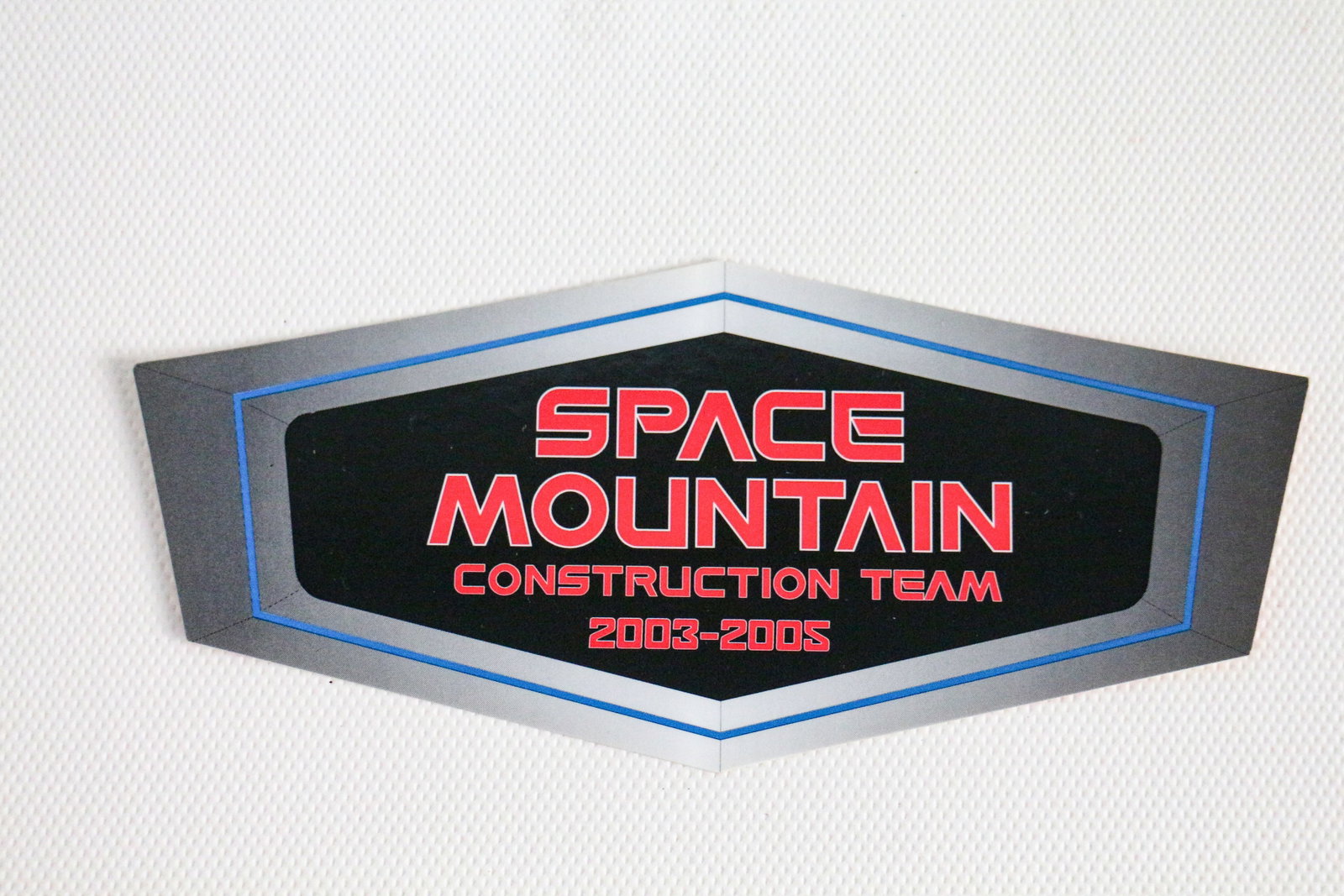 Disneyland - Imagineering “Space Mountain Construction Team” Decal (2003-2005): Walt Disney Imagineers proudly wore this special decal on their helmets during a major rehabilitation of Space Mountain at Disneyland! In 1977, Space Mountain landed and became the first roller