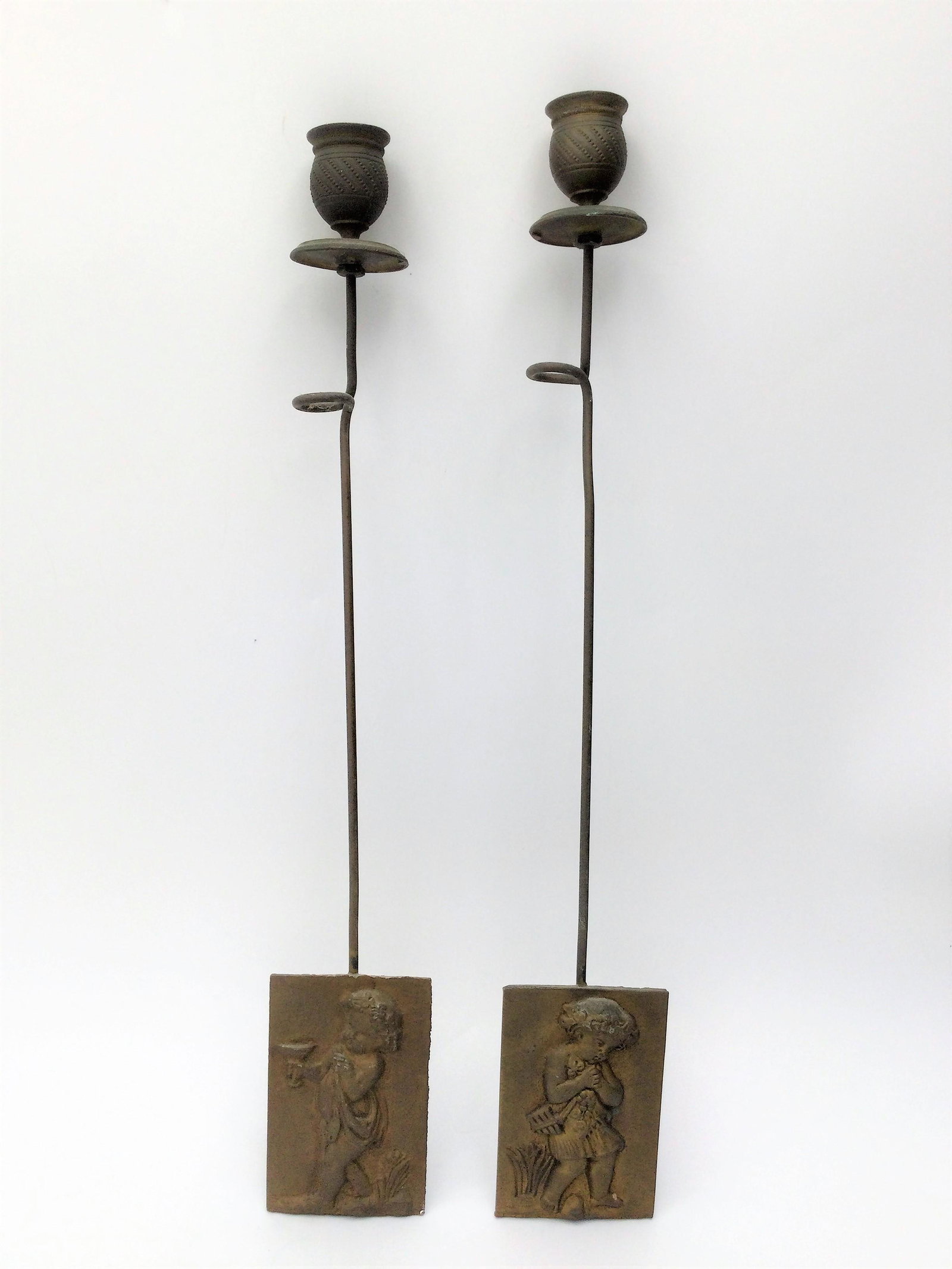 Antique Pair of Wall Candle Sconces Depicting Puttis: Antique pair of wall candle Sconces Depicting Puttis. Each piece is approximately 14 inches tall. Free pick-up at our warehouse. Shipping is done by a 3rd party shipper and will be invoiced separately