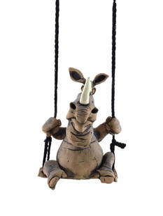 Signed Whimsical Rhino On Swing Sculpture: Whimsical rhino sculpture sitting on a swing. Signed and dated 1997. Approx. size 9.25 inches tall x 6.5 wide x 4.5 deep. Approx. weight 3 lbs. 14 oz. IMPORTANT: For Shipping, please contact our provi