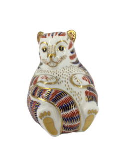 Royal Crown Derby Cat Figurine: Blue, auburn, gold, and white cat figurine sitting on its back. Made by Royal Crown Derby. The approx. size is 3 inches tall x 2.75 wide x 3.5 deep. Weighing approx. 4.8 oz. IMPORTANT: For Shipping,