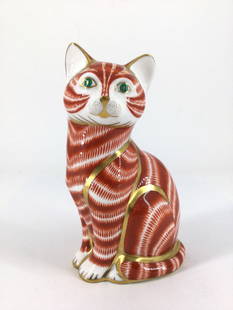 Royal Crown Derby Sitting Cat Figurine: Auburn, gold, and white cat sitting with green eyes made at Royal Crown Derby. Approx. size 5 inches tall x 3 wide x 2.25 deep. Approx weight 4.9 oz. IMPORTANT: For Shipping, please contact our