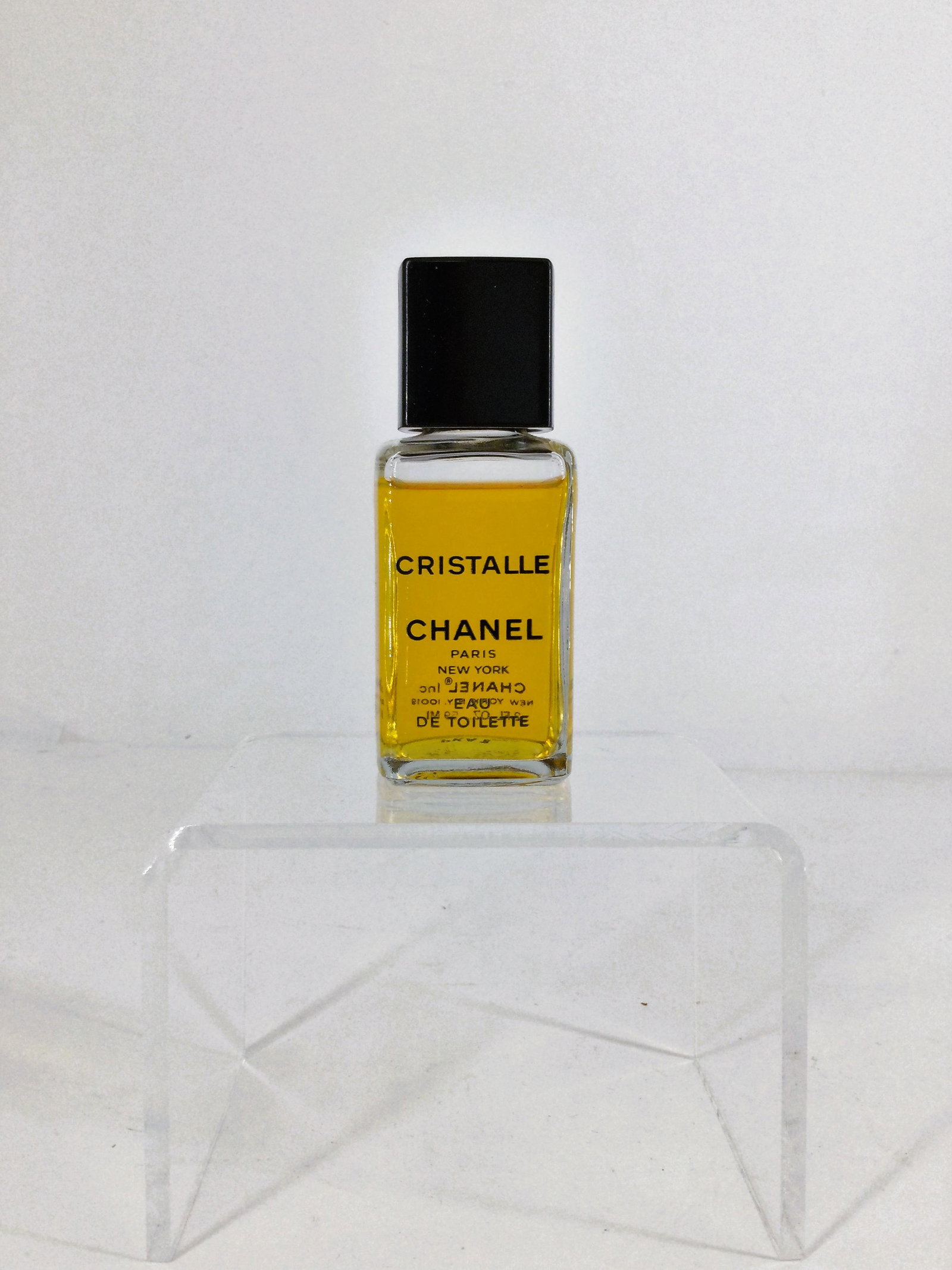 Cristalle Chanel Eau De Toilette 2 Fl. Oz.: Cristalle Chanel Eau De Toilette 2 Fl. Oz. Approx. over 95% full. Approx. size 4 inches tall x 1.5 square. Approx. weight 5.4 oz. IMPORTANT: In House Shipping, No International Shipping.