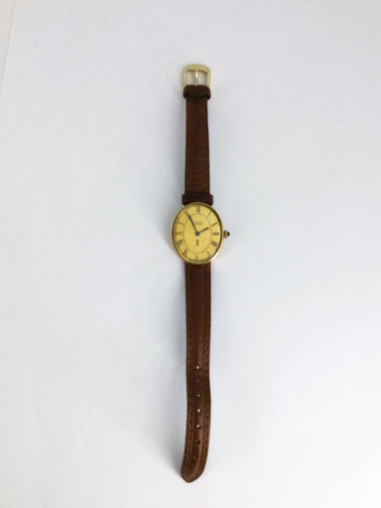 Vintage Cartier 18K G.E. Swiss Watch: Vintage Cartier 18K Swiss Watch. 1 1/8 X 7/8-inch face, 7.5 inches long. Approx. weight 0.8 oz. IMPORTANT: In House shipping.