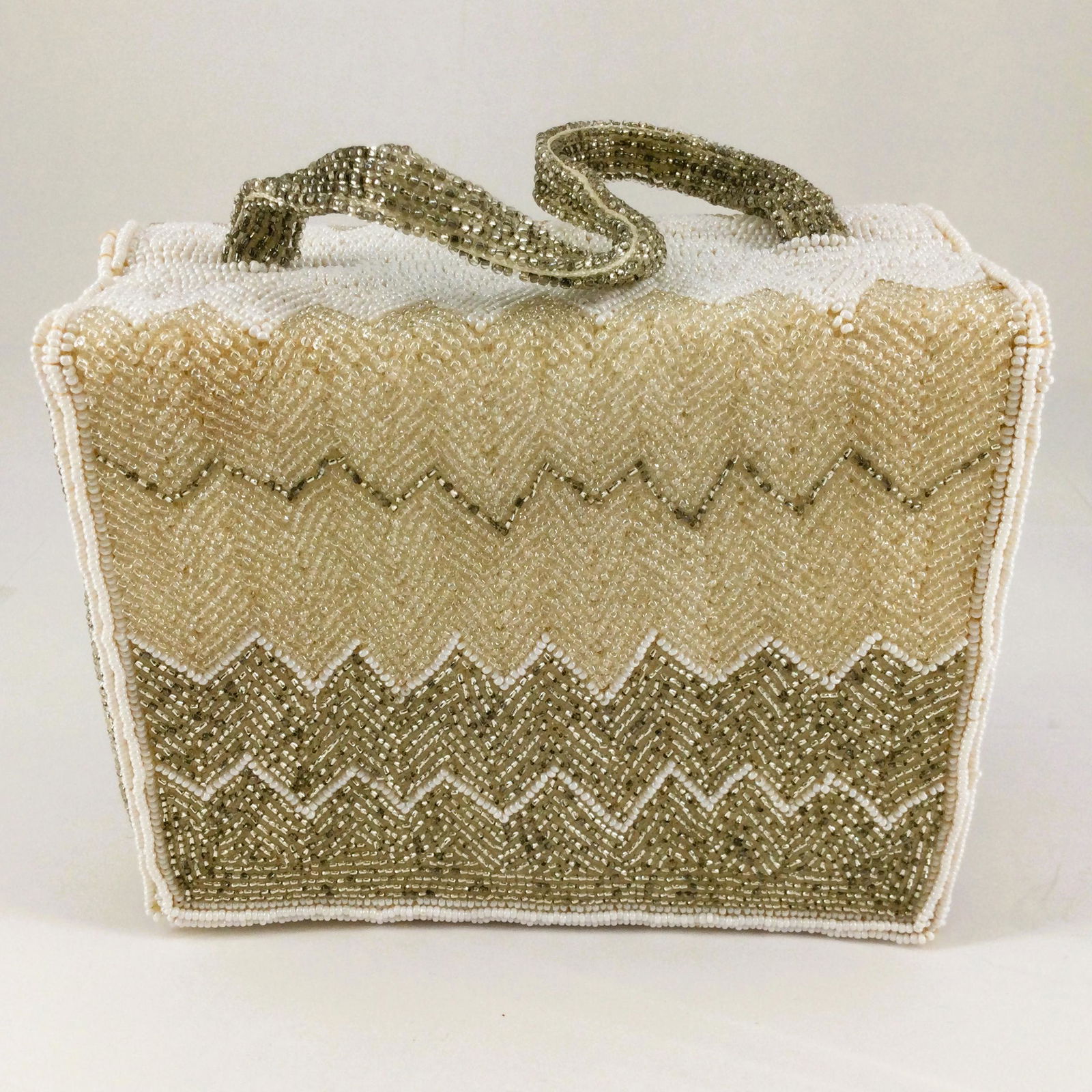 Vintage Handmade Rosenfeld Japan Beaded Handbag: Vintage Handmade Rosenfeld Made in Japan Beaded White, Cream and Silver Duel Sided Purse. Approx. size 5 inches tall x 6 wide x 2.5 wide. Approx. weight 14.1 oz. IMPORTANT: In House Shipping.