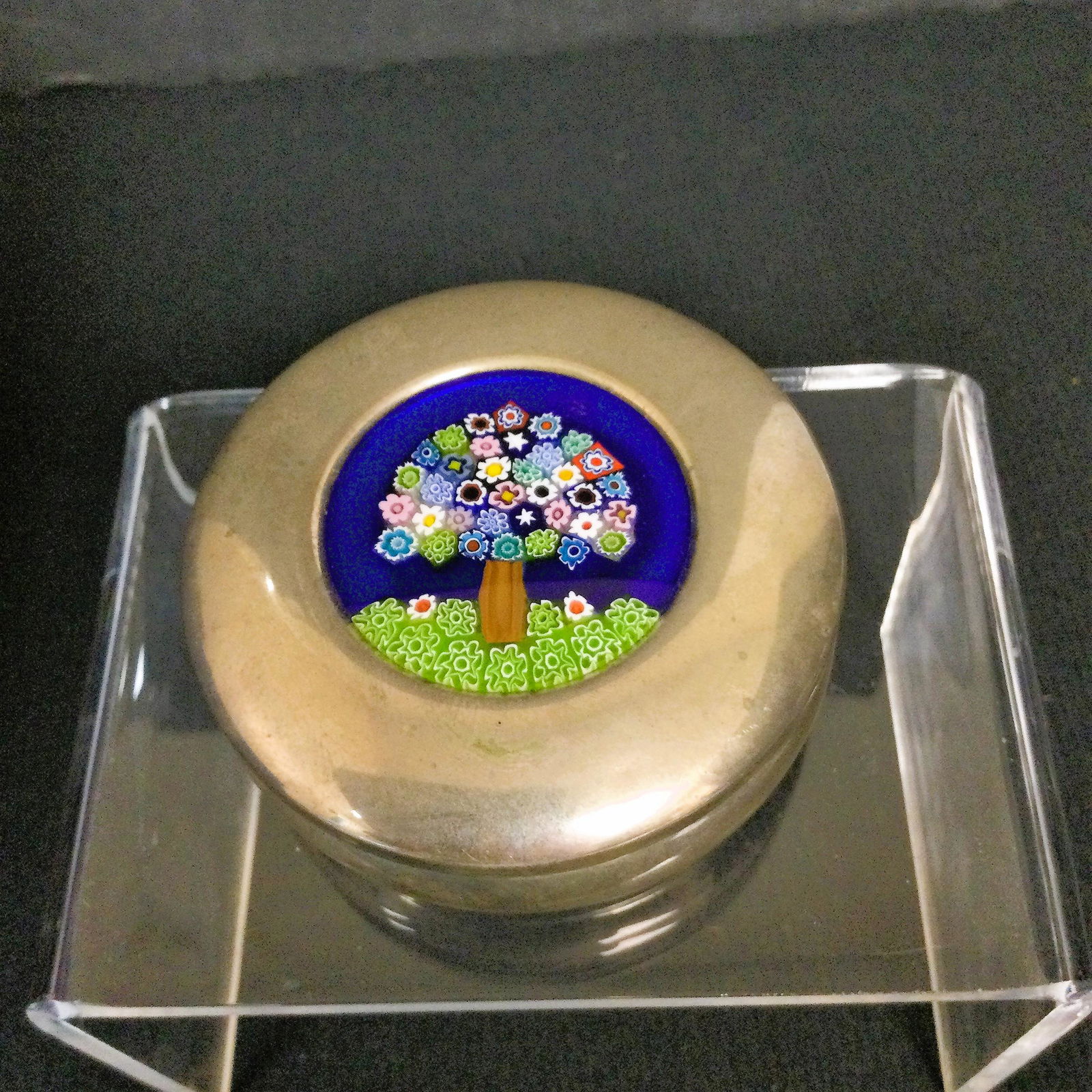 Sterling Silver & Millefiori Millenium 2000 Trinket Box: Celebrity Cruises Millenium 2000 Murano Glass Millefiori Art, of a Tree, On A Round Stirling Silver Trinket Box, Stamped 925. Approx. size1 inch tall x2-5/8 round. Approx. weight 42.1 grams. IMPORTANT