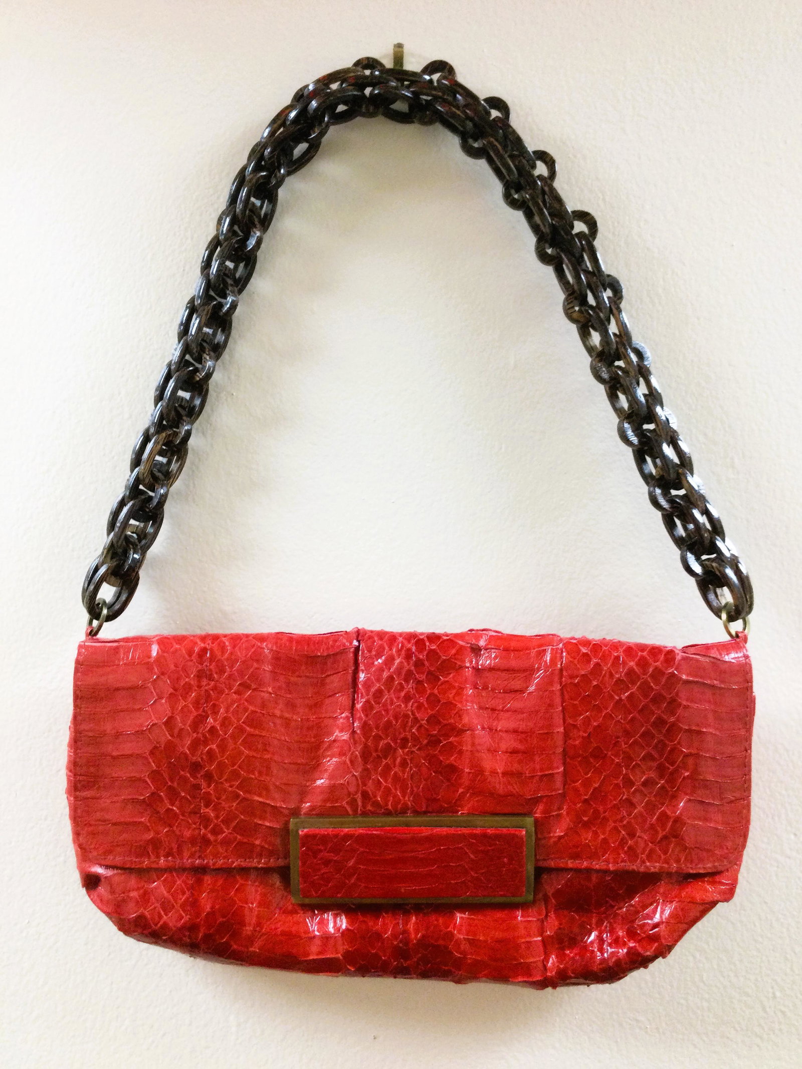 Vintage R&Y Augousti Red Purse With Coconut Shell Strap: Vintage R&Y Augousti Red Croc Pattern Leather Purse with Coconut Shell strap. Approx. size 6 inches tall x 12 wide x 2 deep, 10.5 drop. Approx. weight 14.3 oz. IMPORTANT: In House Shipping.
