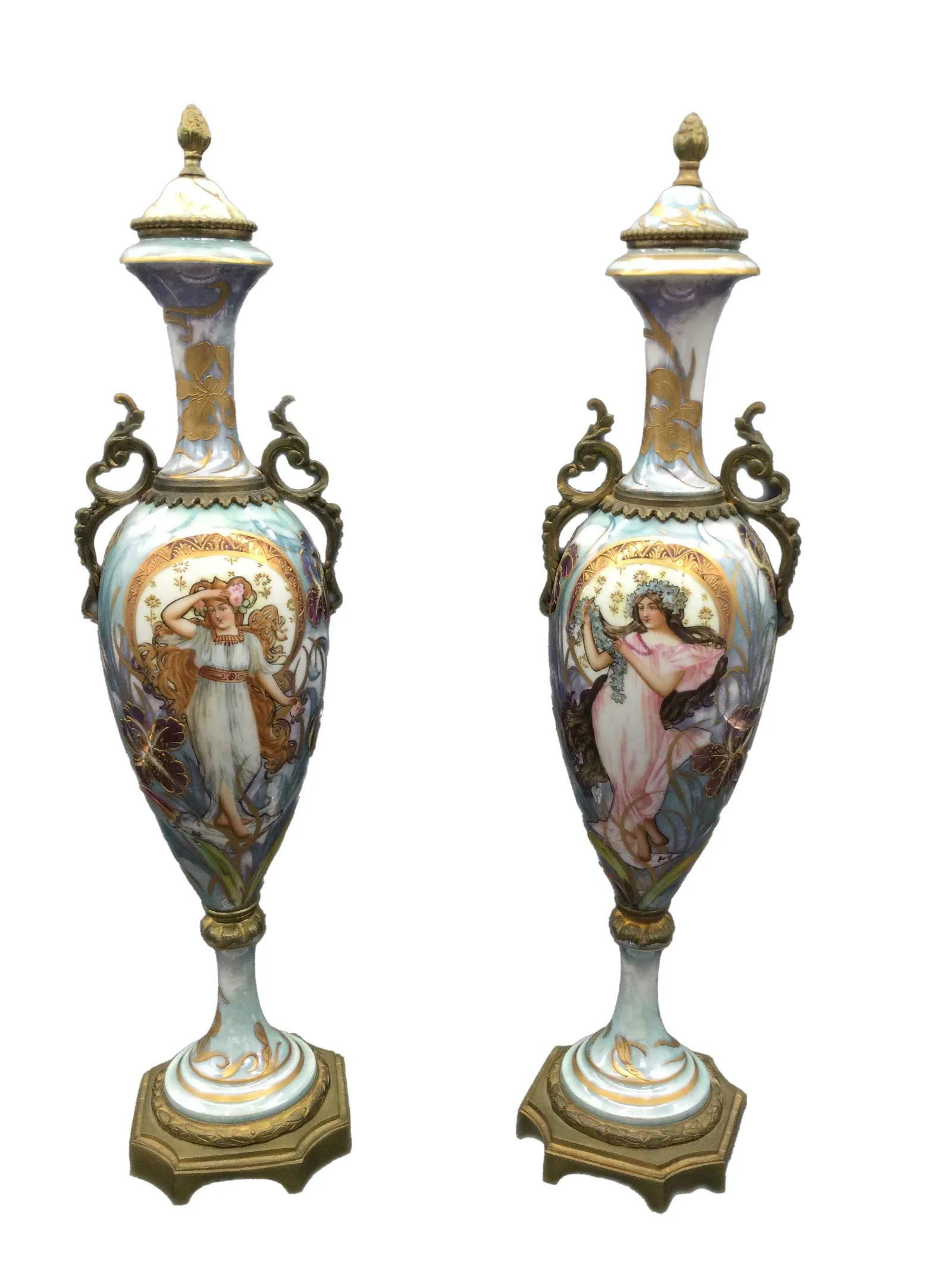 Pair of French Sevres Hand Painted Urns Signed: Pair of French Sevres Hand Painted Urns Signed, with a Floral and Nymph Motif. Measuring approx. 17.5 tall x 4.25 handle to handle, weight 4.8 lbs. IMPORTANT: NO In-House Shipping, Please read our shi