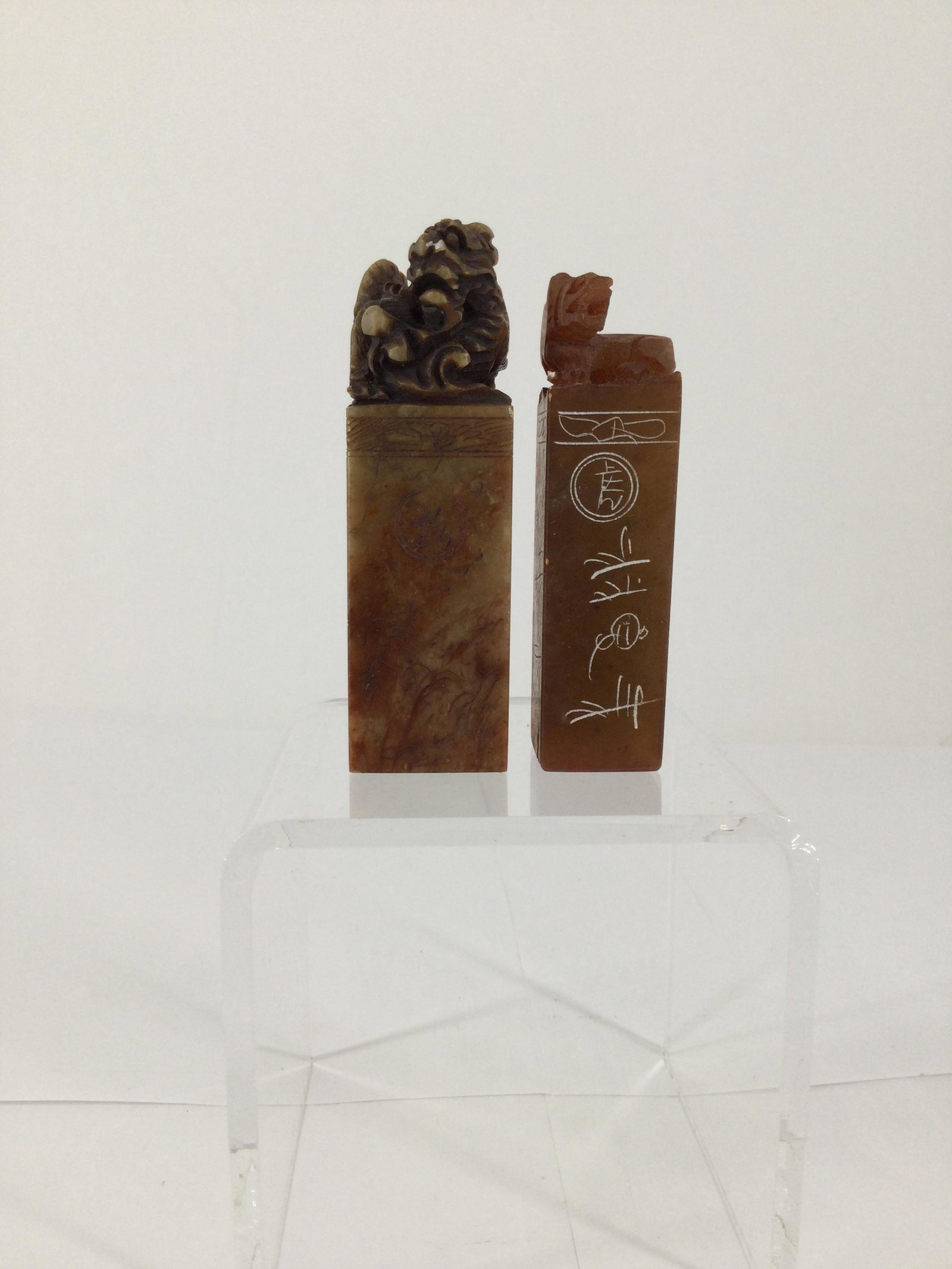 Pair Soapstone Carved Stamps With Dragon and Tiger: Pair of Hand Carved Chop Stamps With Dragon and Tiger. Approx. size (dragon)3.5 inches tall x 1 wide, (fu-lion) 3 tall x 0.75 wide. Approx. weight (dragon) 4.5 oz. (fu-lion) 2.6 oz. IMPORTANT: NO In-H