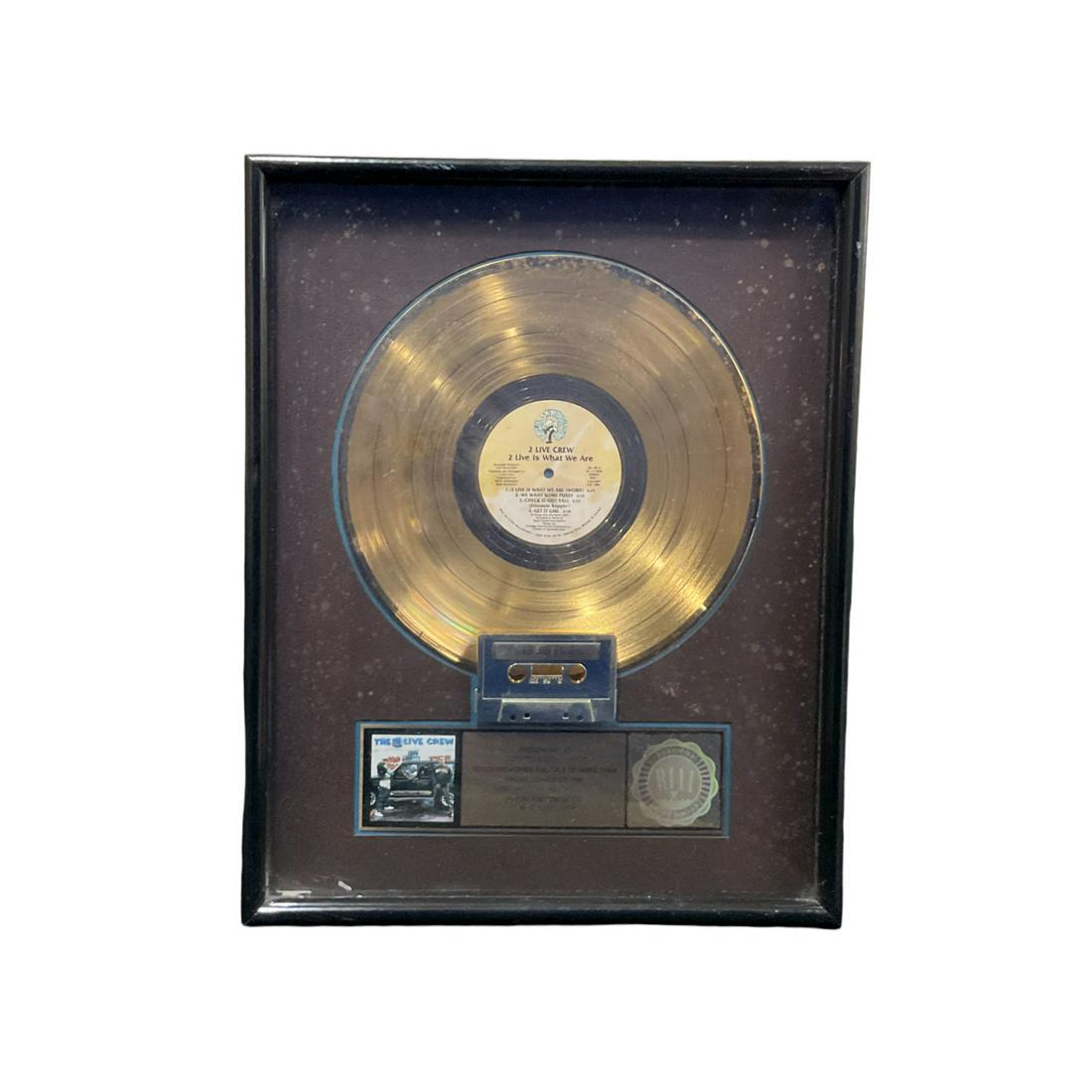 2 Live Crew Gold Record And Cassette for 500,000 Copies Sold: The 2 Live Crew Gold Record And Cassette for 500,000 Copies Sold Presented to George Jones. This was 2 Live Crew's first album. Approx size. 21 inches tall x 17 wide. IMPORTANT: NO In-House Shipping, 