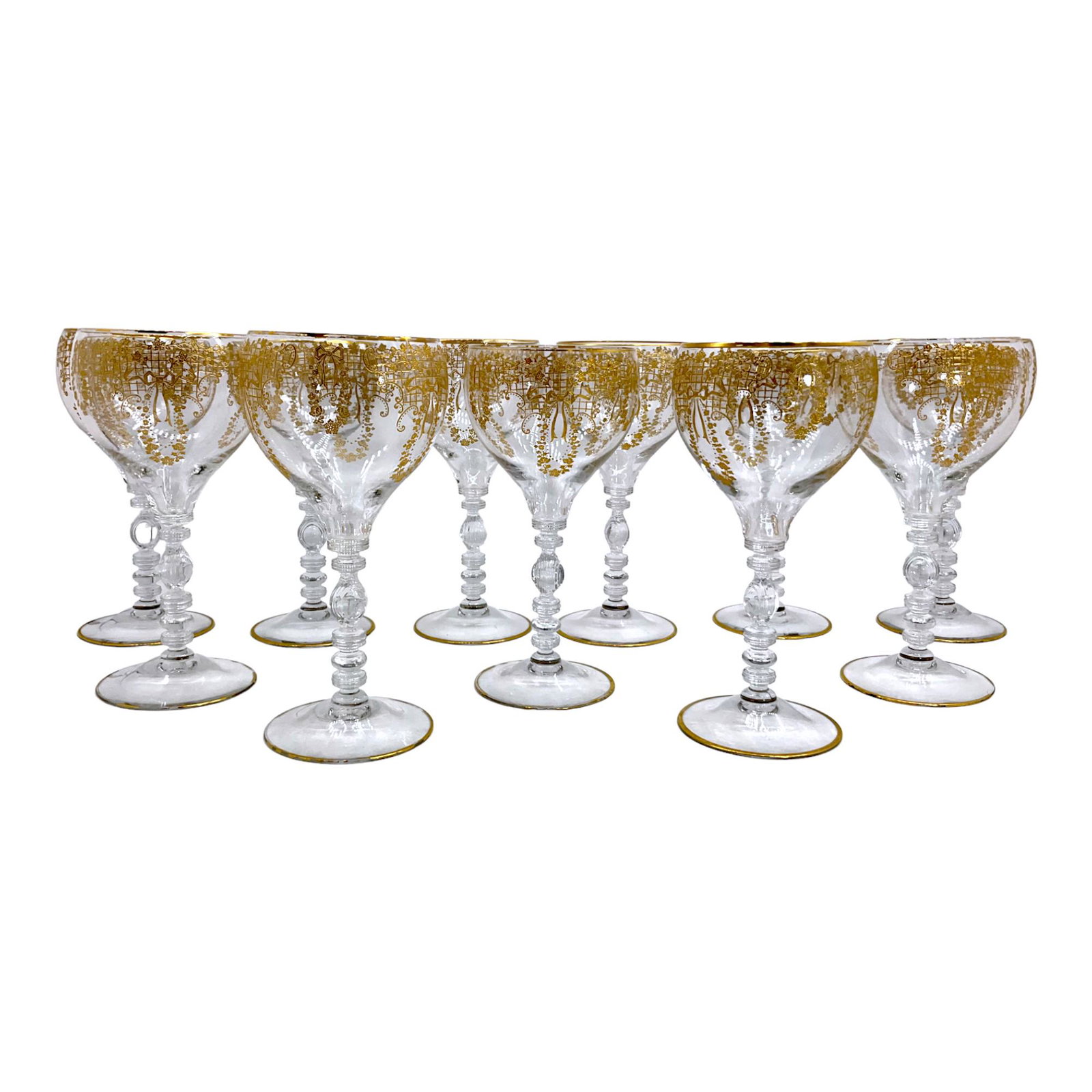 Lot of 11 Antique Gold Encrusted Wine Glasses: Lot of 11 Wine Glasses encrusted gold wreath design. Approx. size 7.75 inches tall x 3.5 wide and deep. Approx. weight each 6.8 oz. IMPORTANT: NO In-House Shipping, Please read our shipping terms for 
