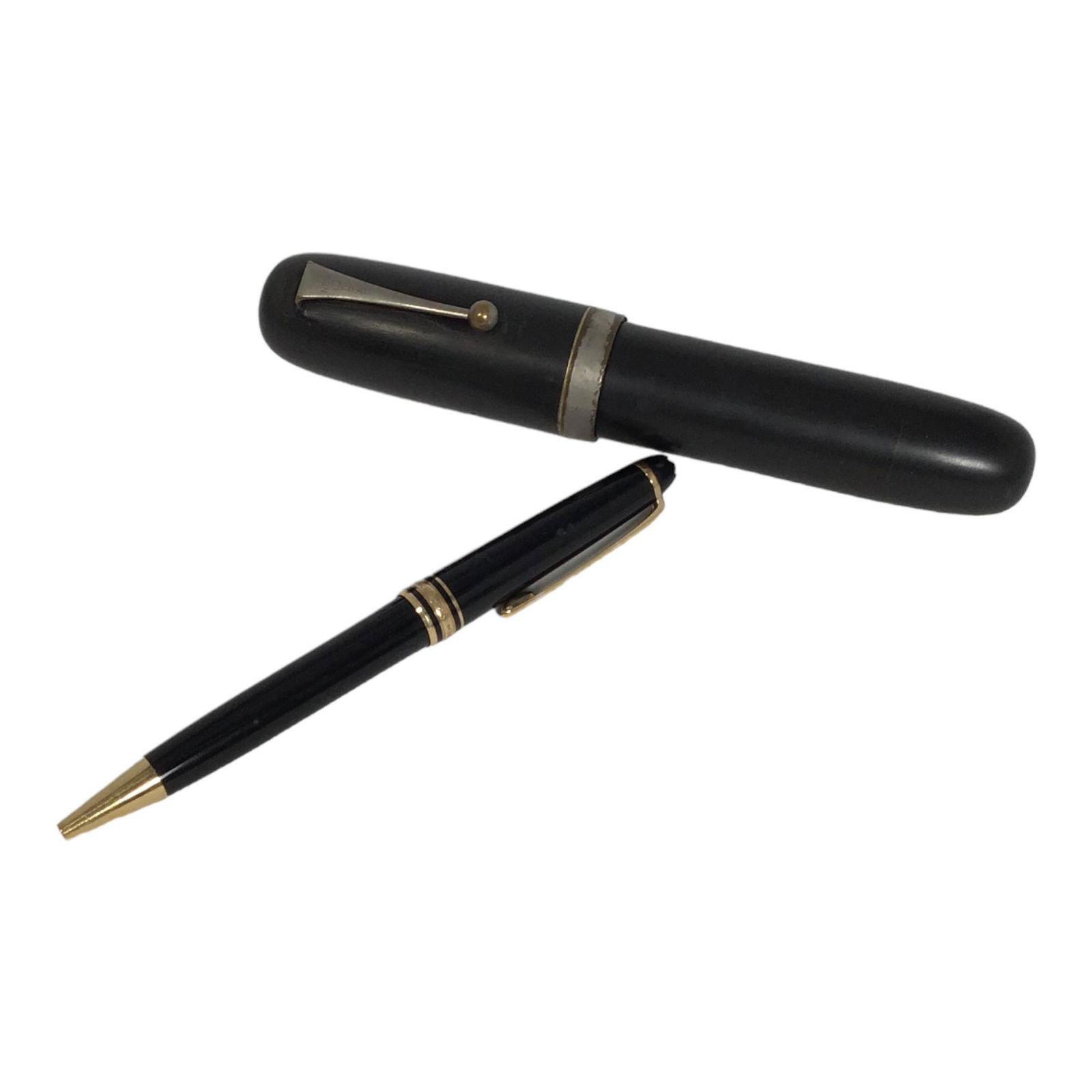 Pair of Vintage Pens, Montblanc and Joriso Oversized Fountain Pen: Montblanc Meisterstuck Black gold-coated ballpoint pen and a Joriso Bakelite body & Iridium tip oversized fountain pen. IMPORTANT: NO In-House Shipping, Please read our shipping terms for provider.