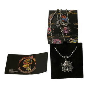 Ed Hardy Love Kills Slowly Necklace with COA: Ed Hardy Love Kills Slowly Necklace, Skull with cross bones and banner Pendant - Necklace approx. 24 inches long. Comes with COA and original box.