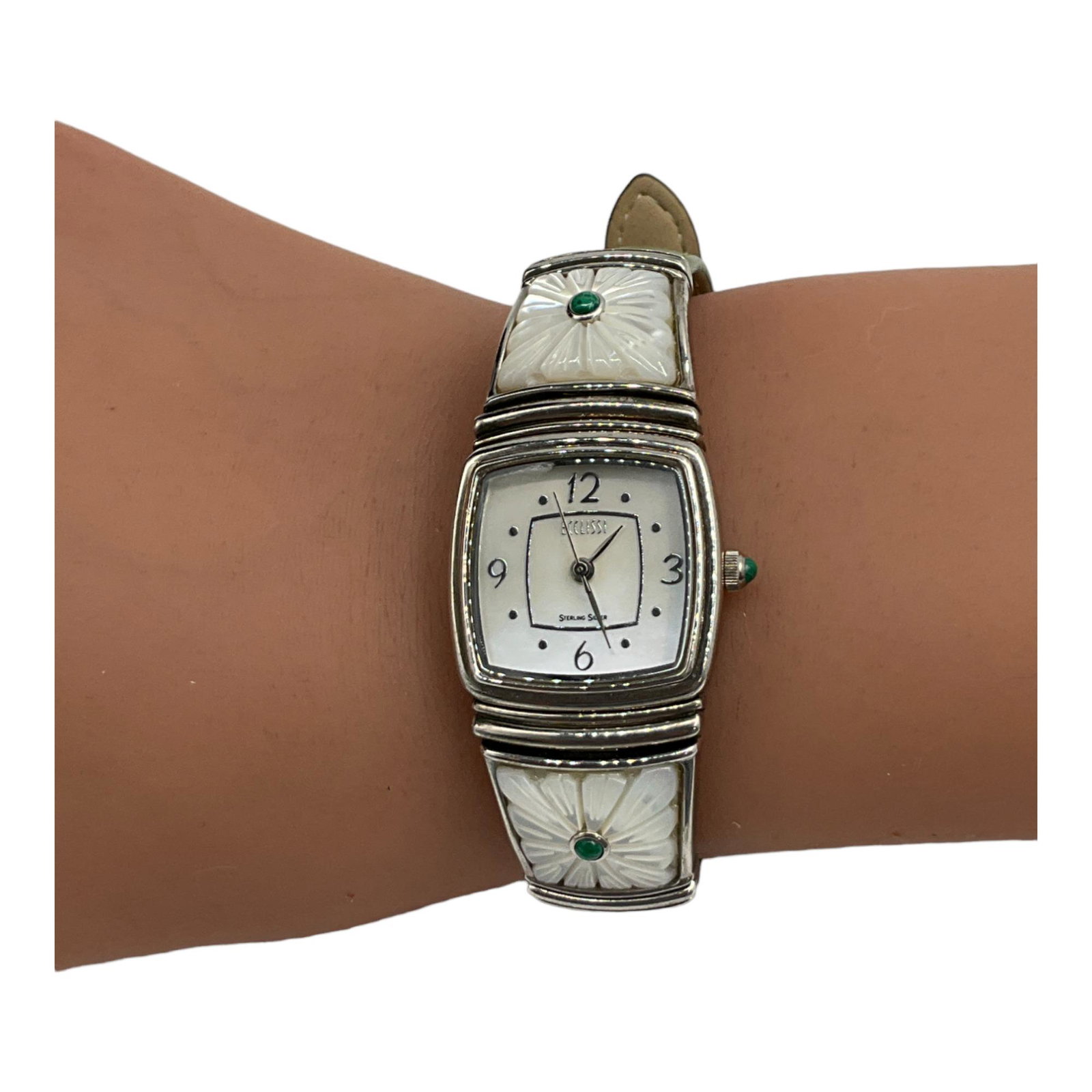 Ecclissi Ladies Sterling Silver Watch: Ecclissi ladies' sterling silver, Japanese quartz watch with green leather wristband, MOP inlaid with turquoise on each side. Approx. size 1-inch-wide face, 8.5 inches for the band.