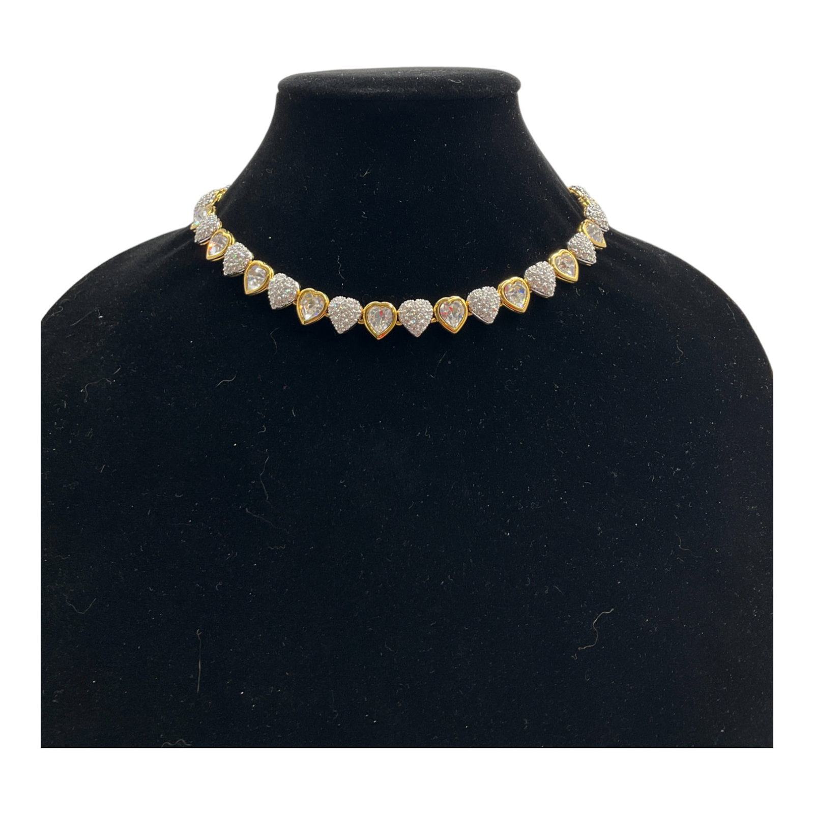 Swarovski Signed Gold Tone Heart Shaped Choker: Swarovski Signed Gold Tone Choker consisting of heart shaped links embelished with clear crystals. Approx. 18 inches end to end.