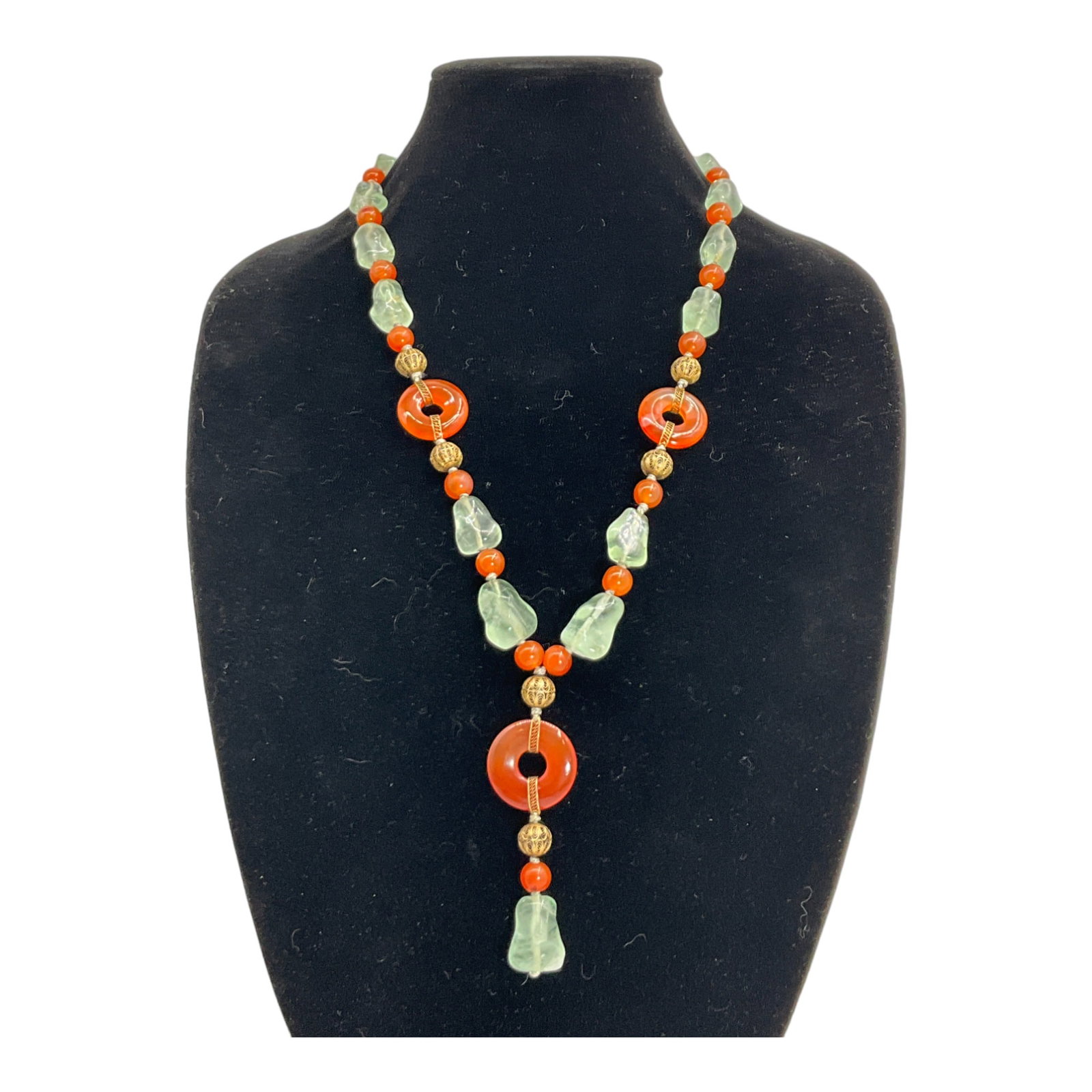Vintage Chinese Carved Fluorite and Carnelian Necklace: Chinese Carved Fluorite and Carnelian Necklace With Silver Clasp and filigree bead spacers. Necklace 26 inches end to end - Center Pendant 3 inches long.