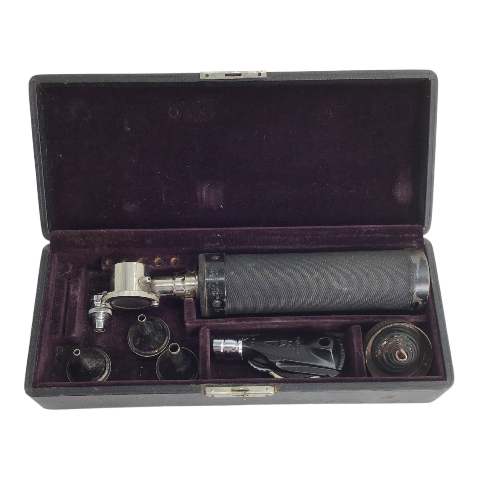 Vintage Doctor's Welch Allyn Co. Otoscope: Vintage Doctor's Welch Allyn Co. Otoscope with some attachments in box. An otoscope is a handheld tool with a light and a magnifying lens that allows a healthcare provider a better look inside the ear