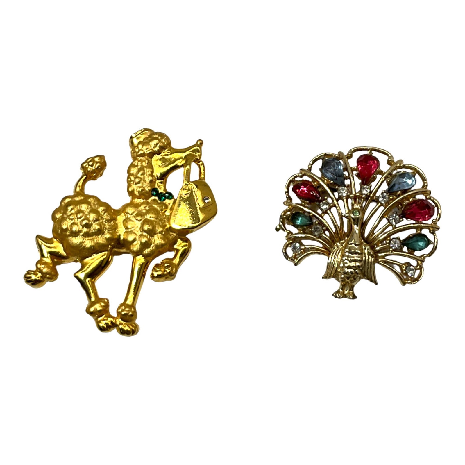 Vintage Lot of 2 Figural Brooches: Vintage lot of 2 figural Brooches, Poodle brooch signed JJ - approximately 2.25 tall x 1.75 inches wide, Peacock with multicolored rhinestones 1.25 tall x 1.5 at widest.