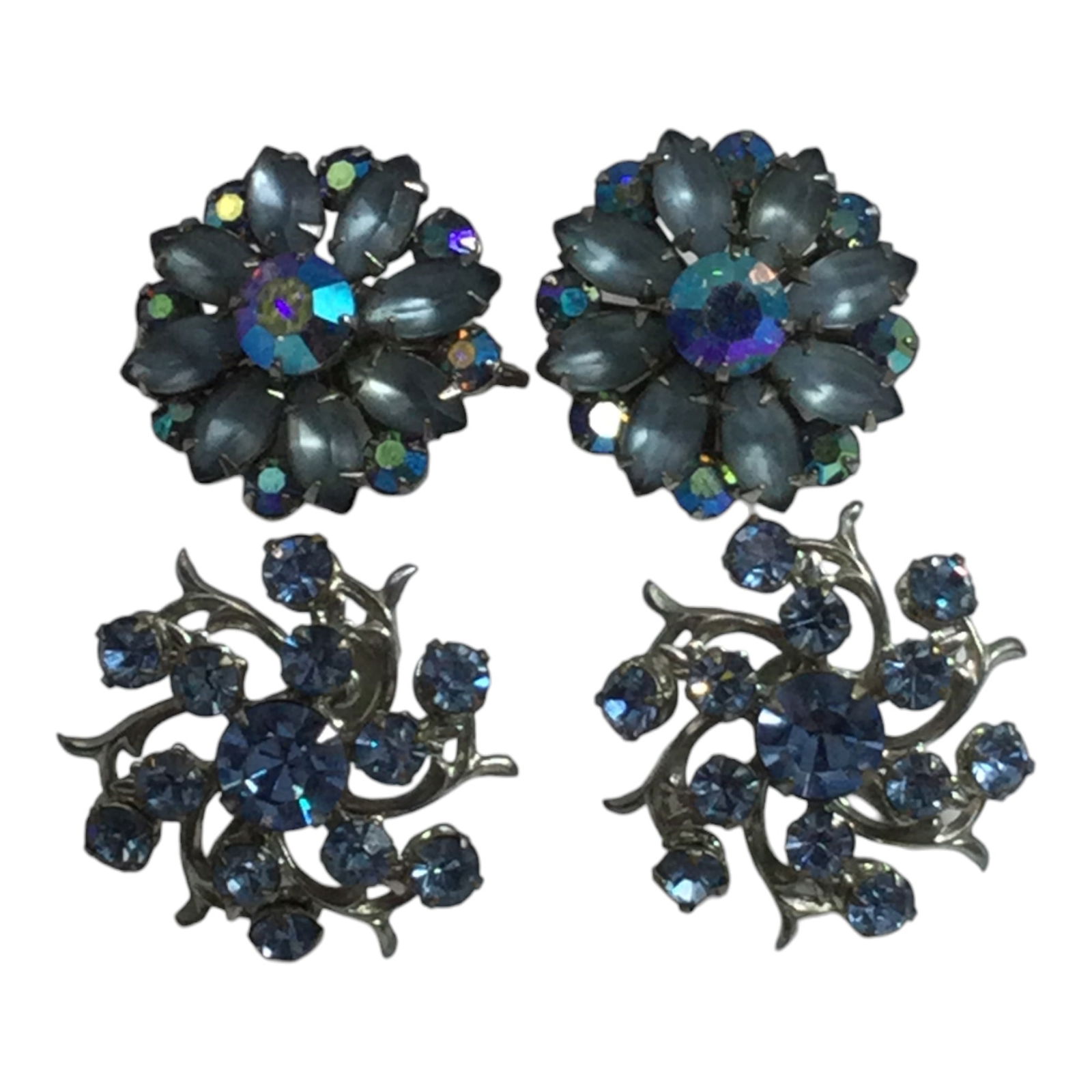 Vintage 2 Pairs of Blue Rhinestone Clip on and Screw Back Earrings: 2 Pairs of Vintage Earrings, one Pair stamped as Coro approximate size 1 inch round, the other screwbacks are unsigned with blue and clear rhinestones and approximately 1 inch round.