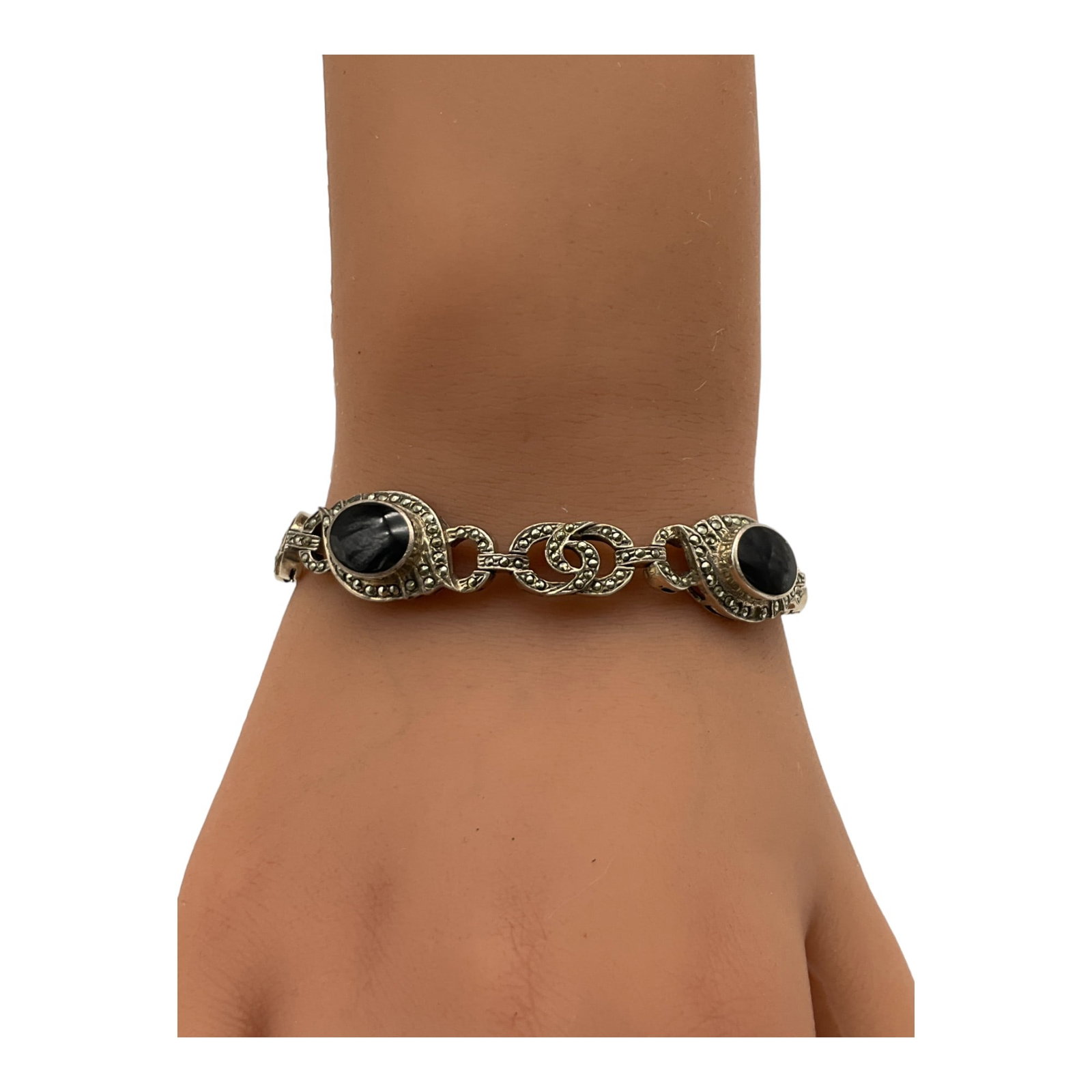 925 Marcasite and Onyx Bracelet: Stamped 925 Marcasite and Onyx Bracelet. Approx. 7 inches long.