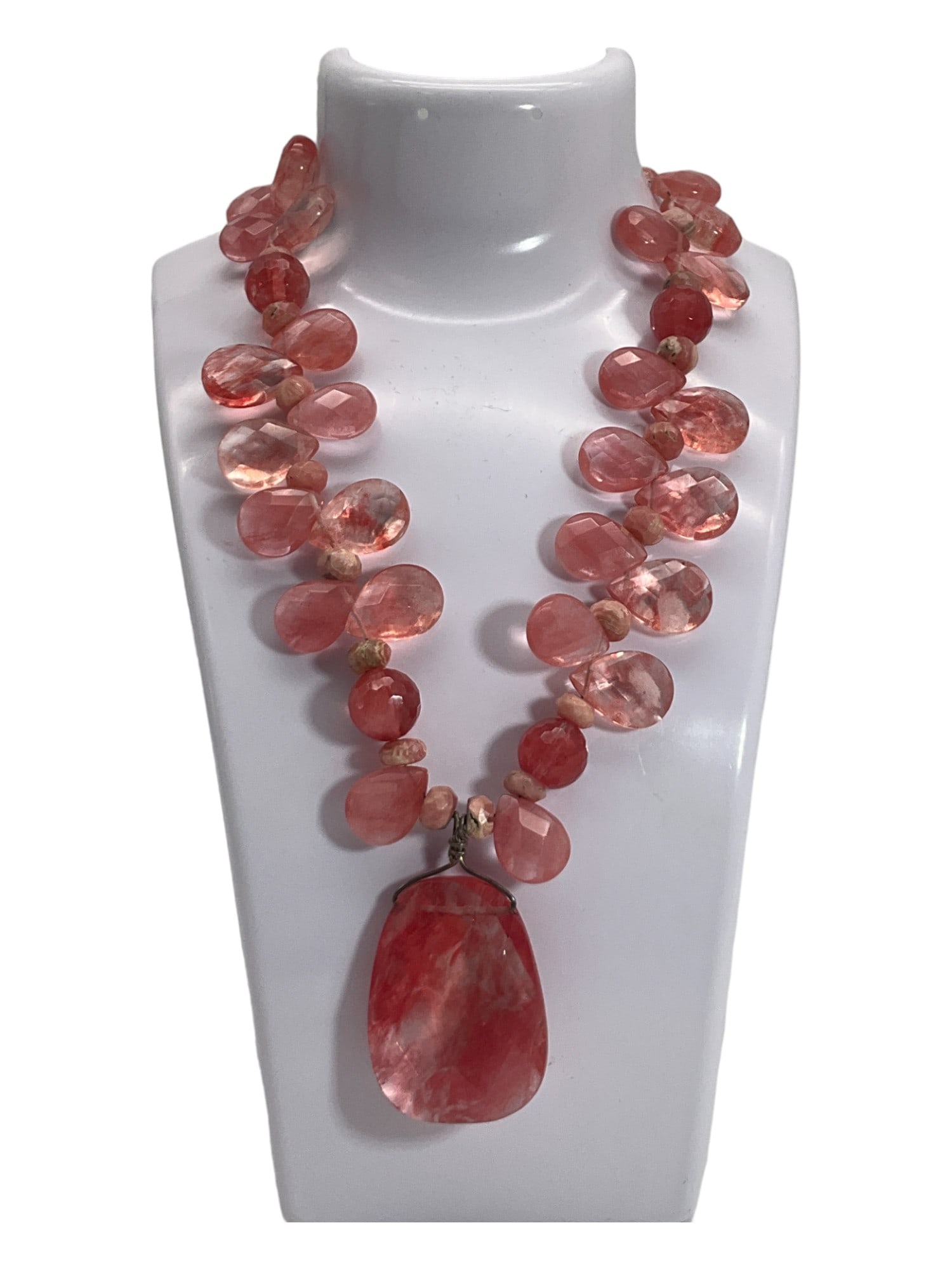 Sterling Silver Cherry Quartz Beaded Necklace: Sterling Silver Closure, Flower Shaped, Cherry Red Faceted Quartz Beads Necklace. Approx. 15 inches long, center pendant 1.75 x 1.25 inches.