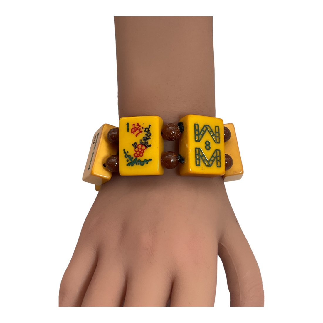 Bakelite Bracelet, Mahjong Tiles: Expandable Bracelet made from bakelite Mahjong Tiles. 7 tiles with spacers, tiles approx. 1.25 x 7/8 of an inch wide.