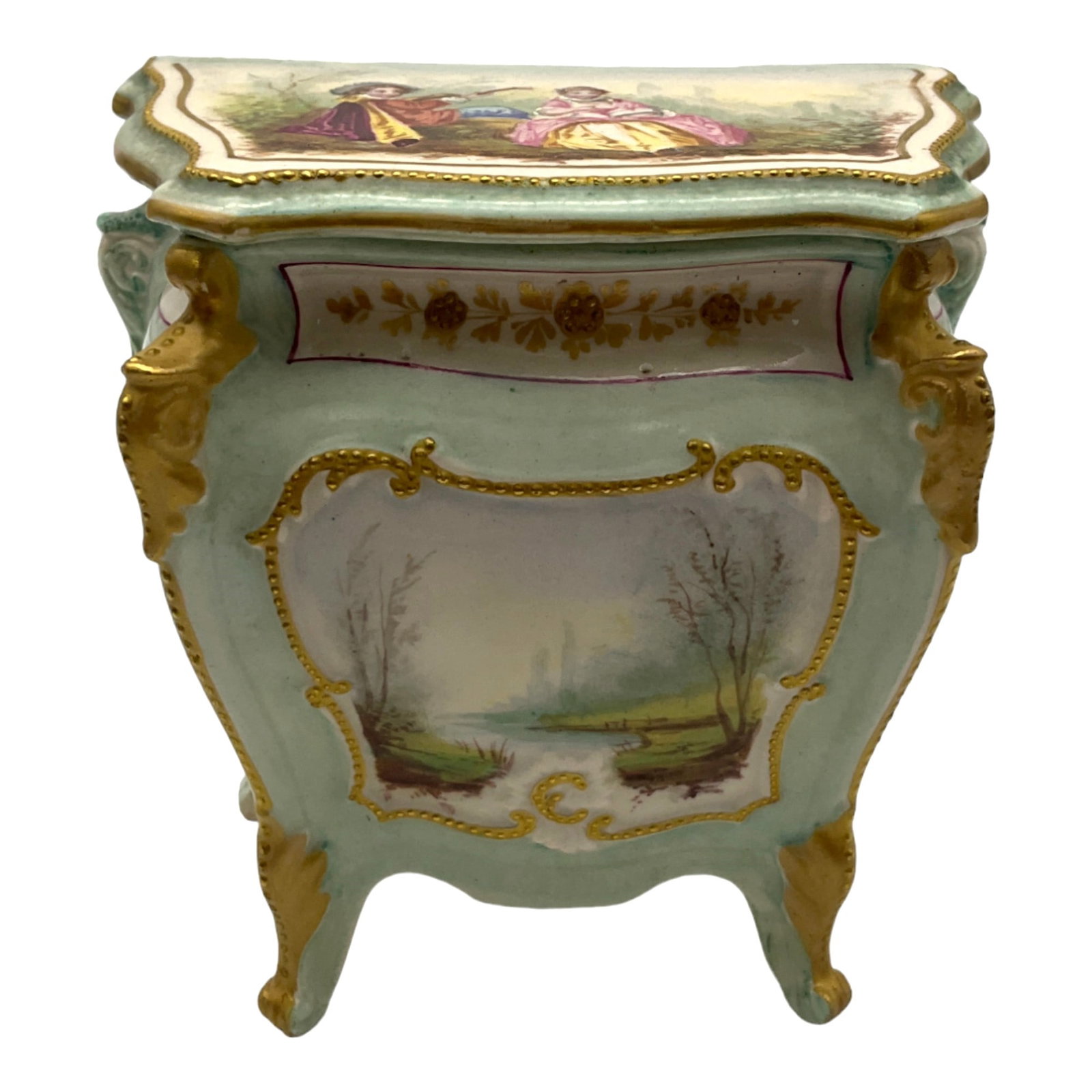 Vintage Bombe Cabinet Shaped Porcelain Trinket Box: Vintage Bombe Cabinet Shaped Porcelain Trinket Box with Fragonard Scene on Lid and Landscape Scenes on 3 sides, number 69 incised on base no other hallmarks. Approx. 5.25 tall x 5.25 at widest x 3.25 