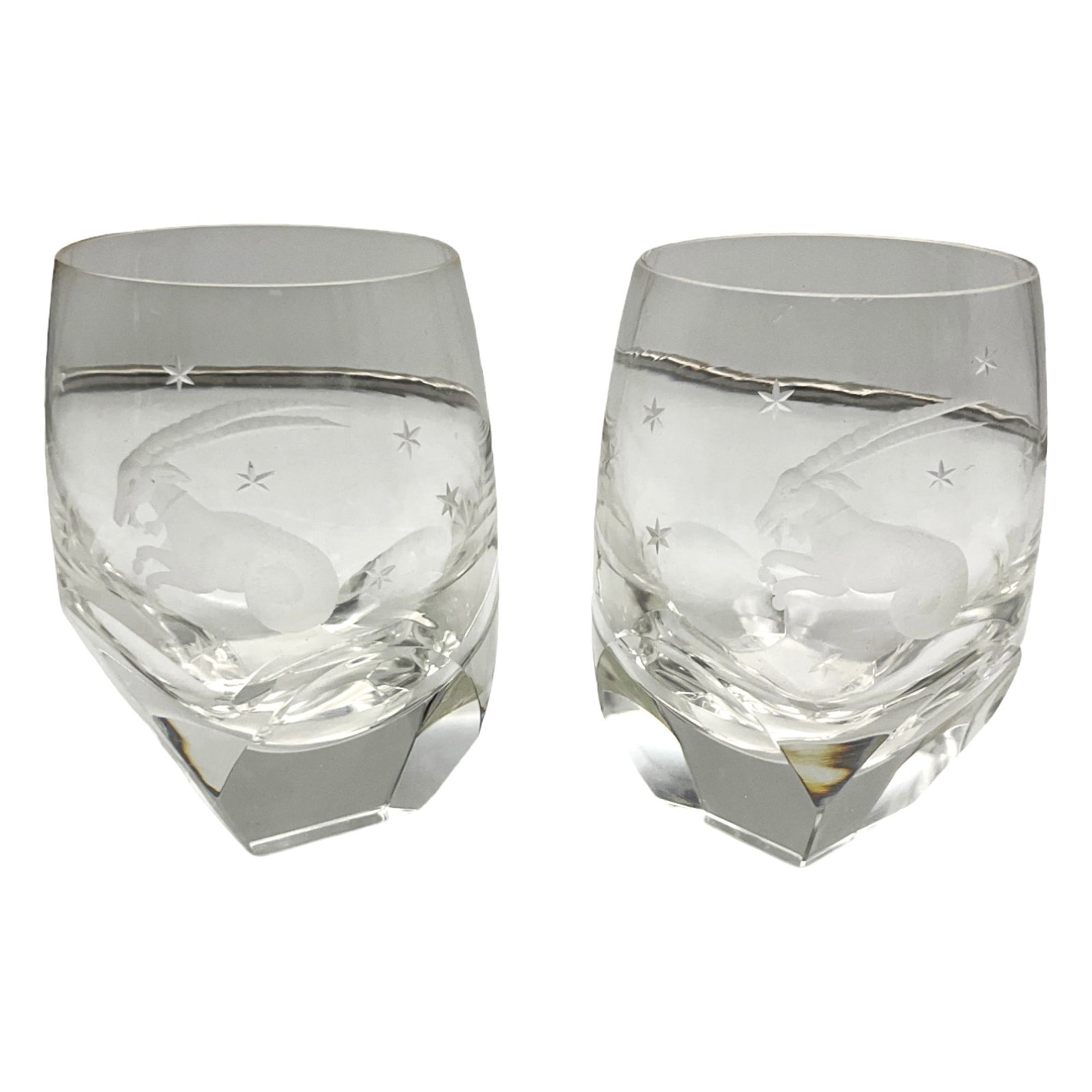 Pair Capricorn Etched Whisky Glasses: Pair Capricorn Etched in Whisky Glasses. Approx. 5 Inches tall x 3.25 across, 2.3 lbs.
